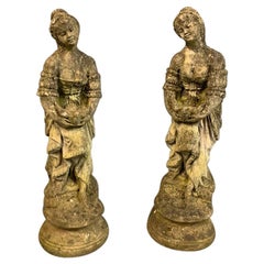 Pair of Mid-20th Century Reconstituted Stone Figures of Girls Holding Doves