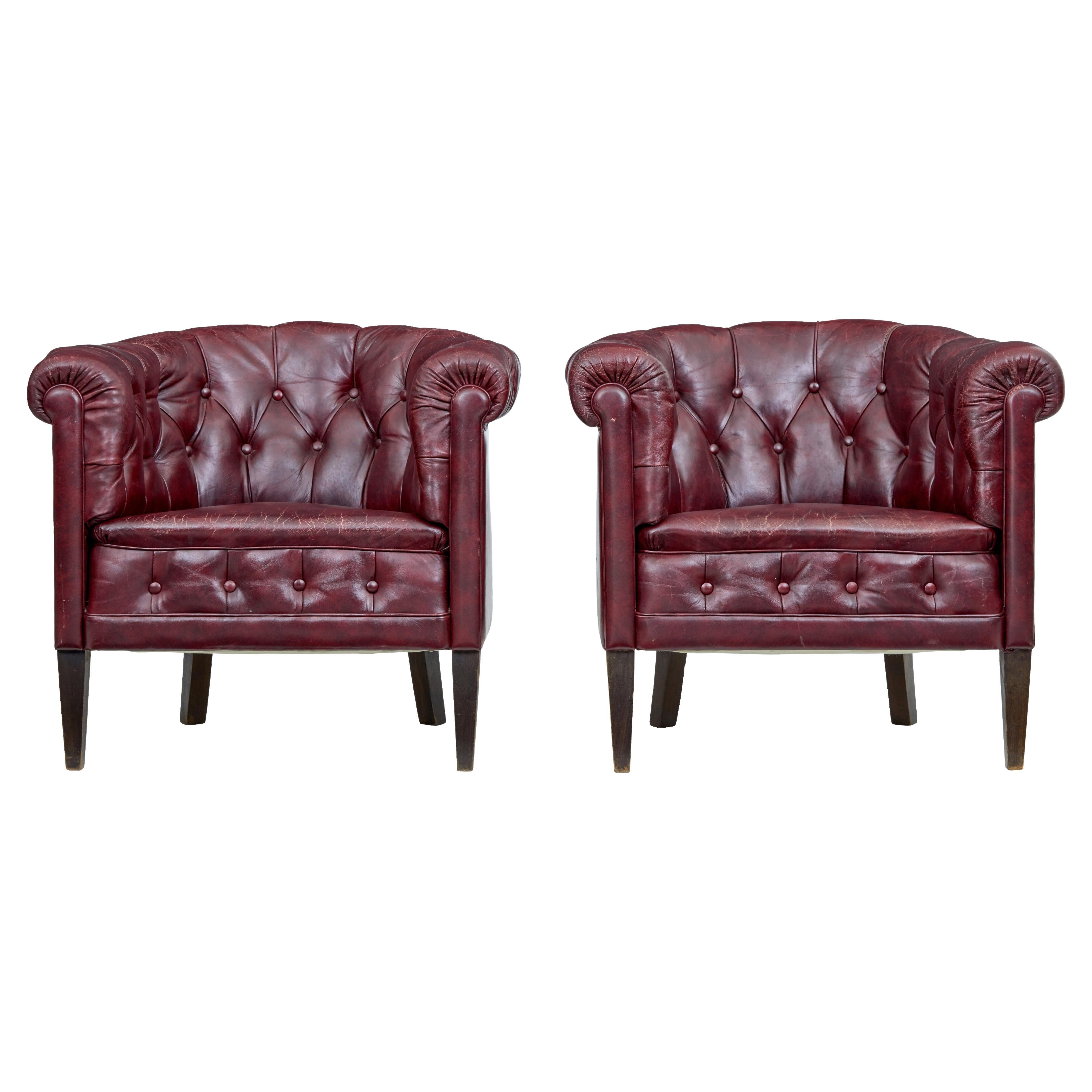 Pair of mid 20th Century red leather club armchairs