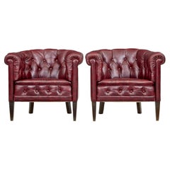 Retro Pair of mid 20th century red leather club armchairs