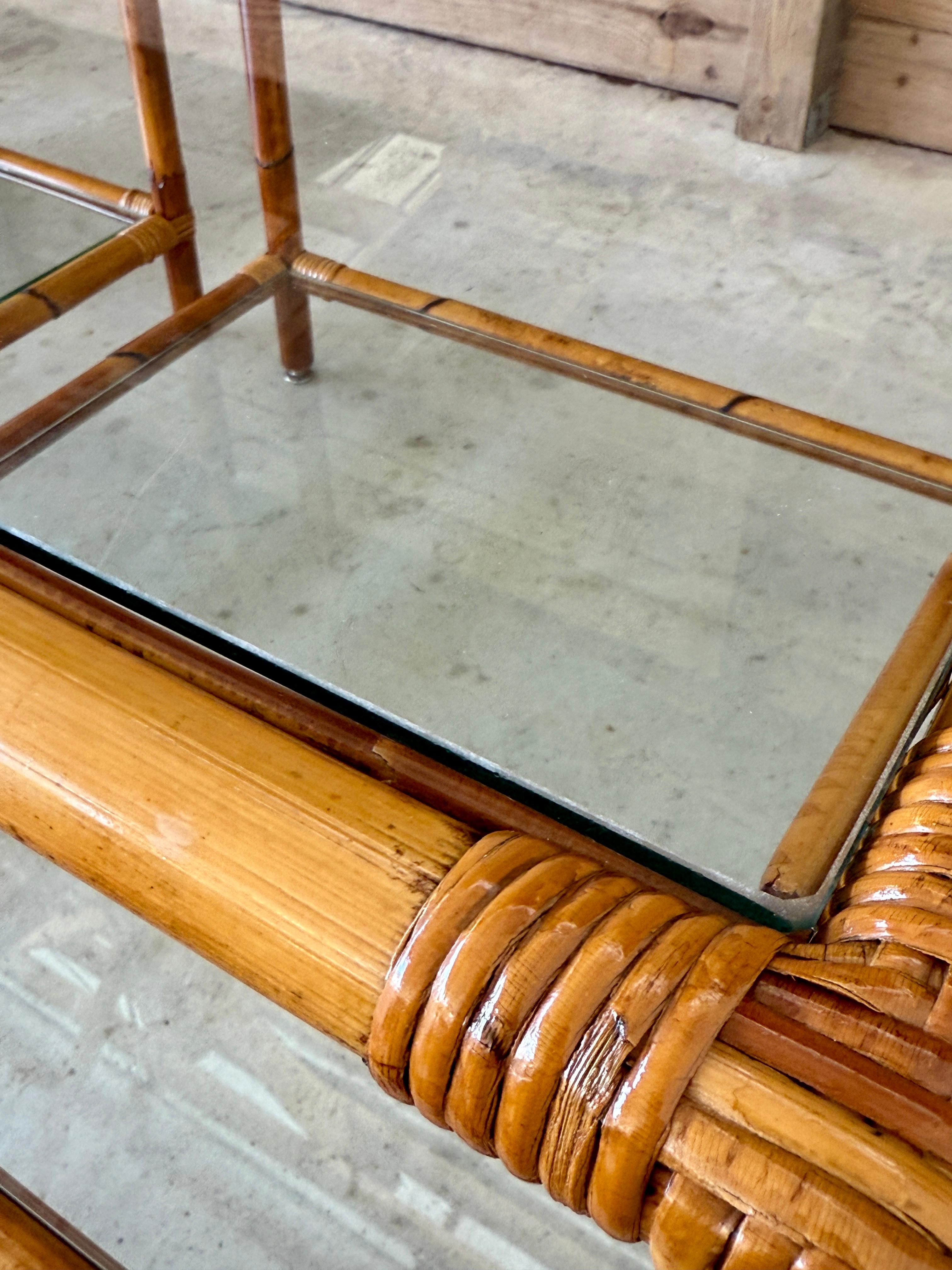 Hand-Crafted Pair of Mid-20th Century Refinished Two-Tier Rattan Side Tables With Glass Shelv For Sale