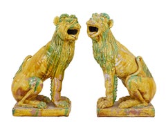 Pair of mid 20th century salt glazed decorative dogs of Fo