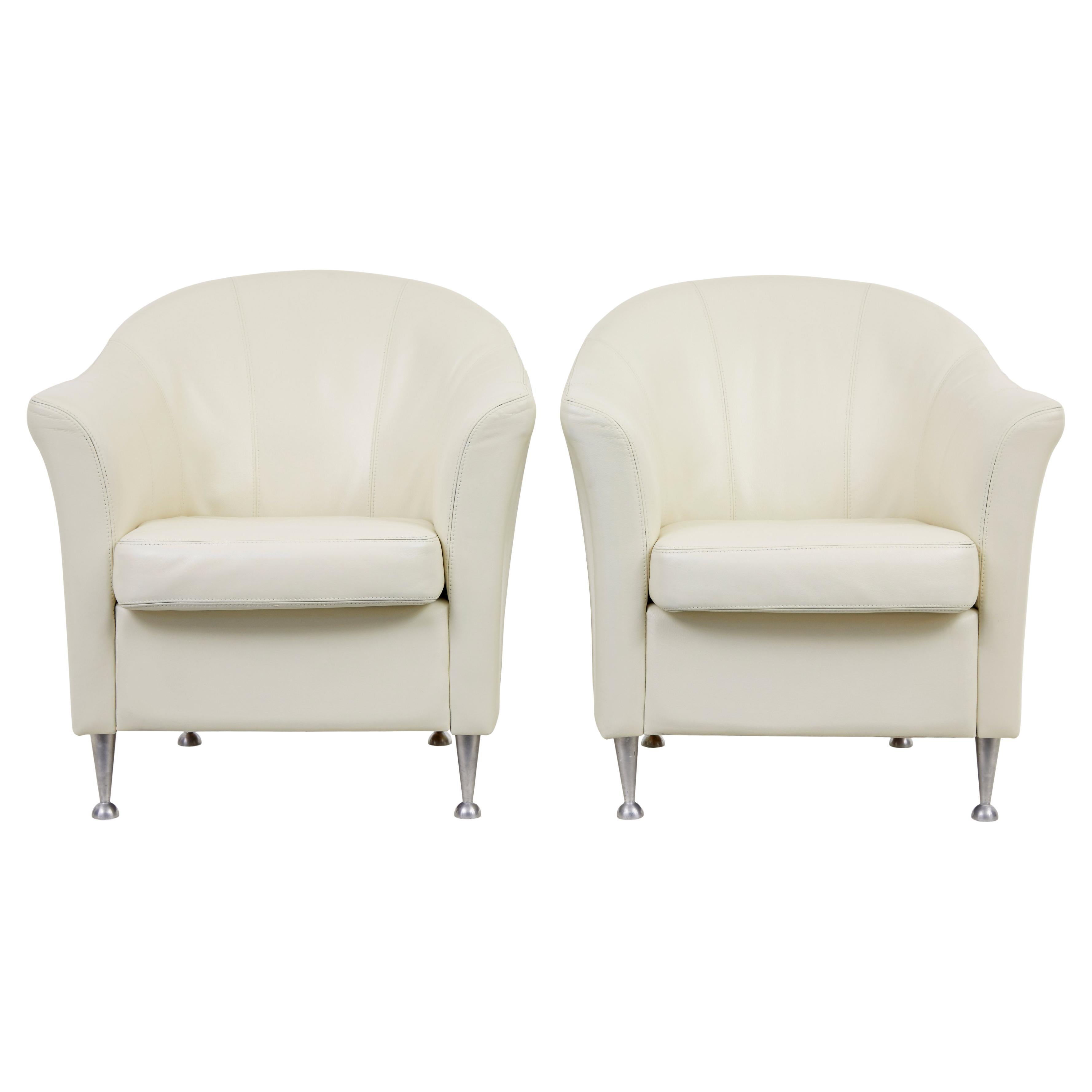 Pair of mid-20th century Scandinavian leather tub armchairs
