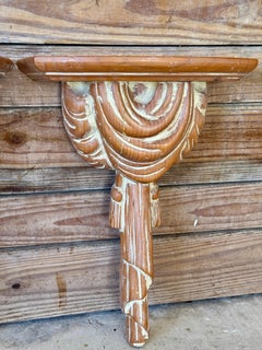 Pair of Mid-20th Century Sculptural Spanish Carved Wood Tassel and Drapery Motif