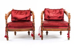 Pair of Mid-20th Century Spanish Revival Carved Barrel-Back Chairs