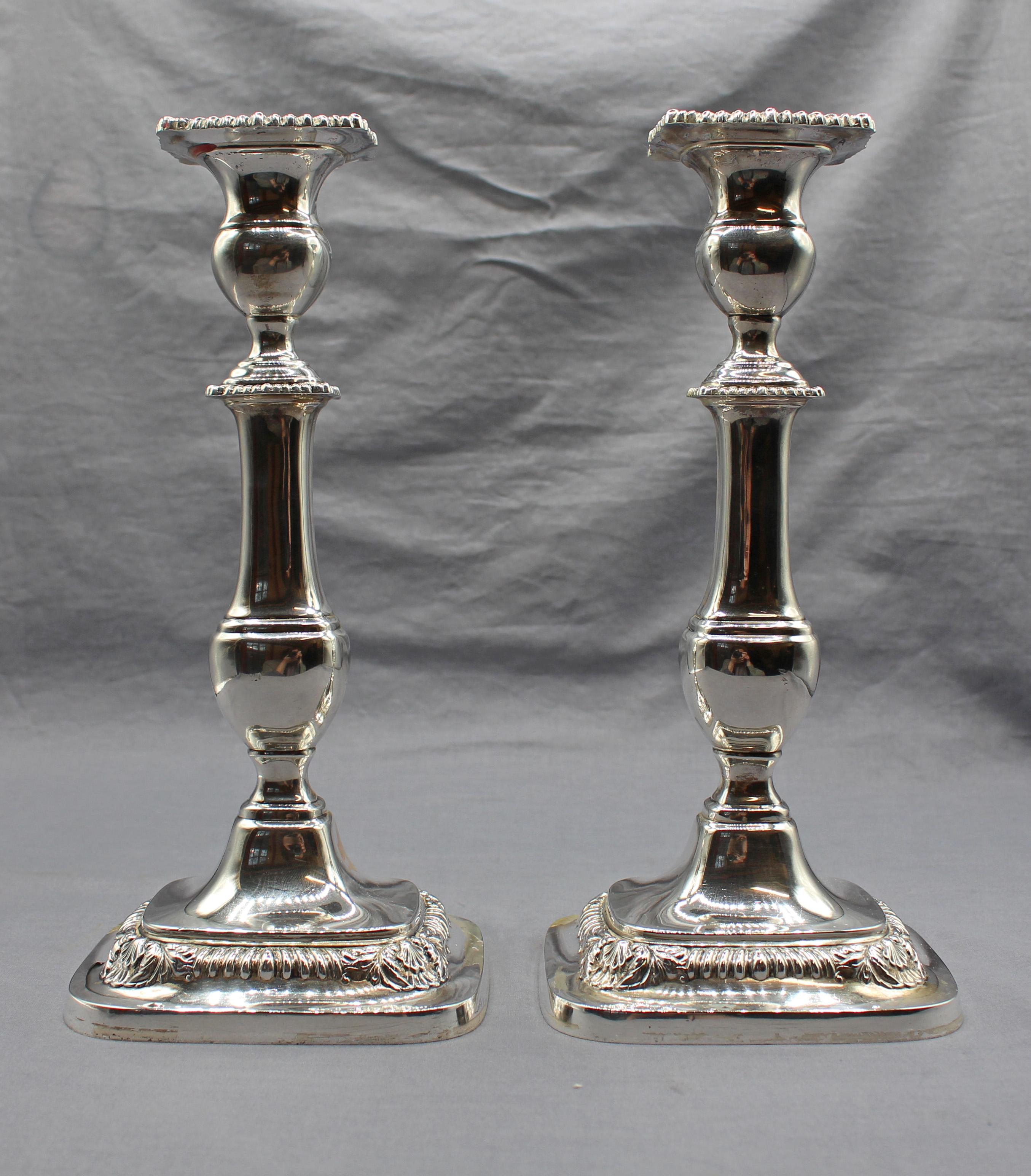 Mid-20th century pair of sterling silver candlesticks, Lord Robert pattern by International. Weighted bases. Shell & gadroon motif.

10 3/4