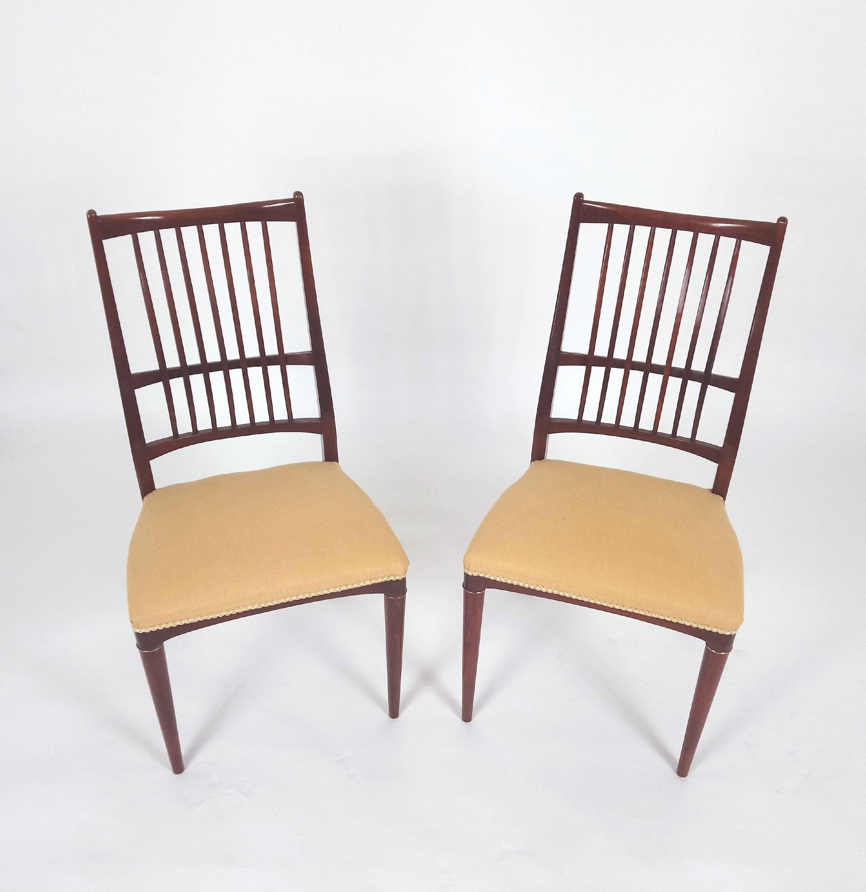 These stylish and sleek beech side chairs feature brass ringed legs and gold woven upholstered seats. Each chair measures 18 in – 45.7 cm wide, 16 in – 40.6 cm deep and 36 in – 91.5 cm high with a seat height of 17 in - 43.2 cm. The chairs are made