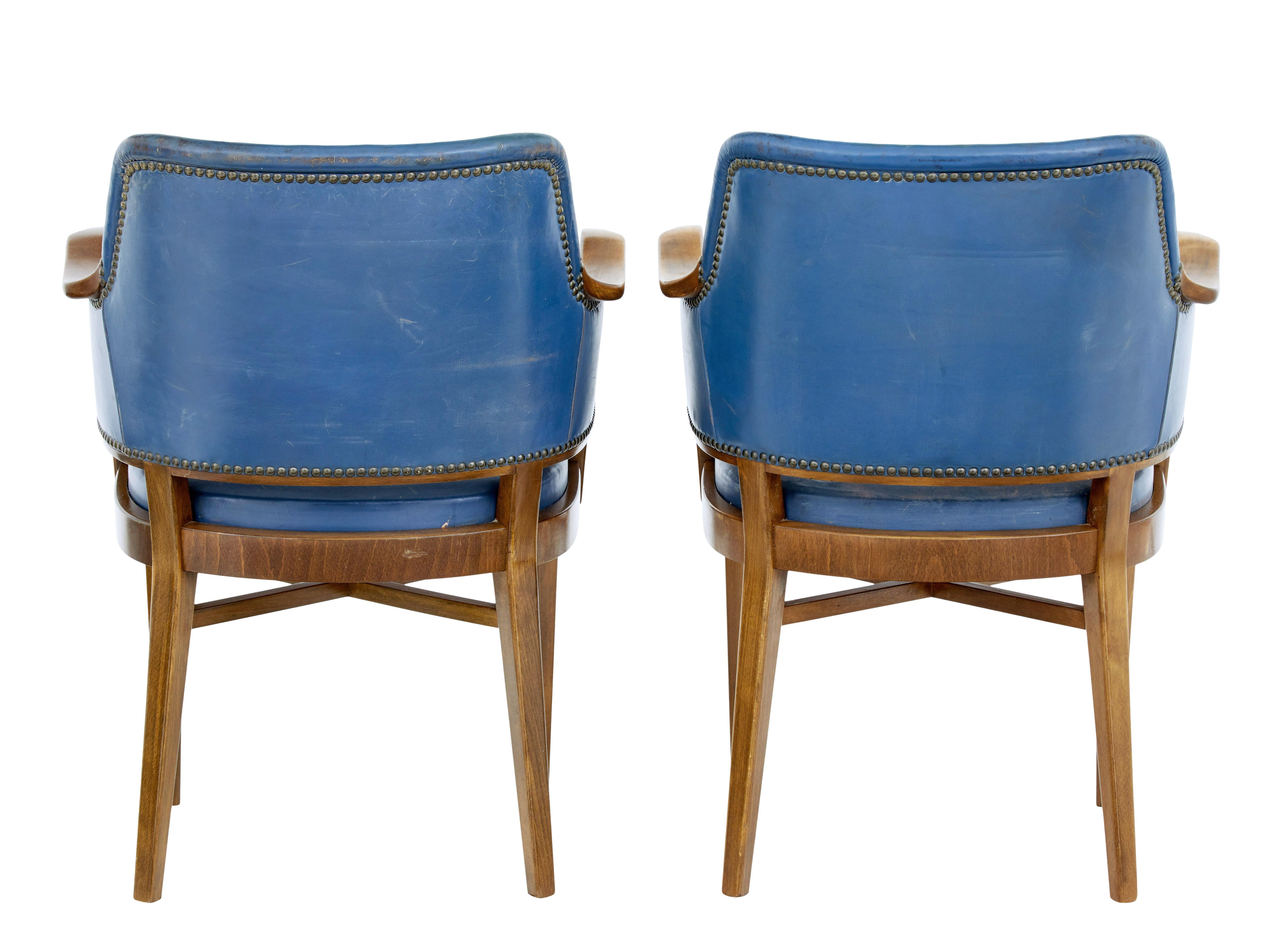 Mid-Century Modern Pair of Mid-20th Century Teak and Leather Armchairs