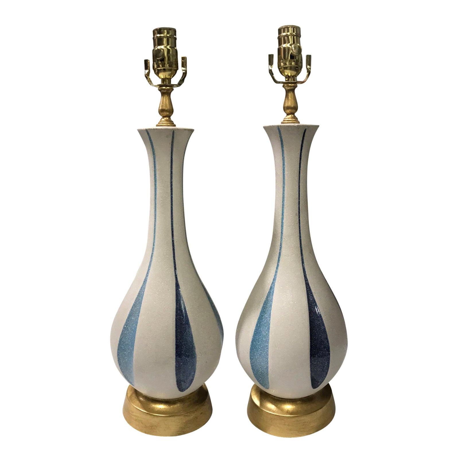 Pair of Mid20th Century White and Blue Pottery Lamps on Custom Gilt