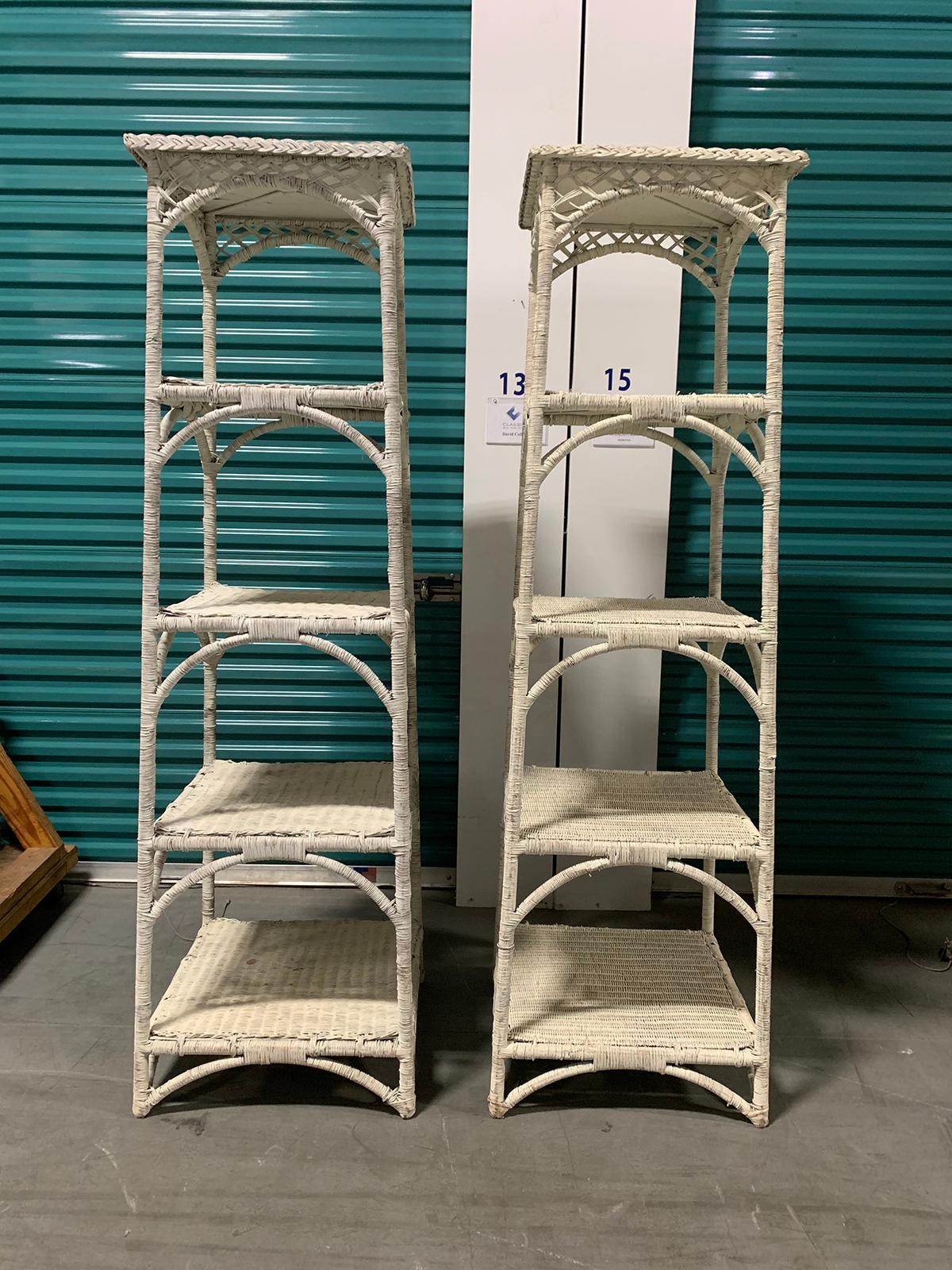 Pair of mid-20th century white whicker étagères with reinforced shelving.