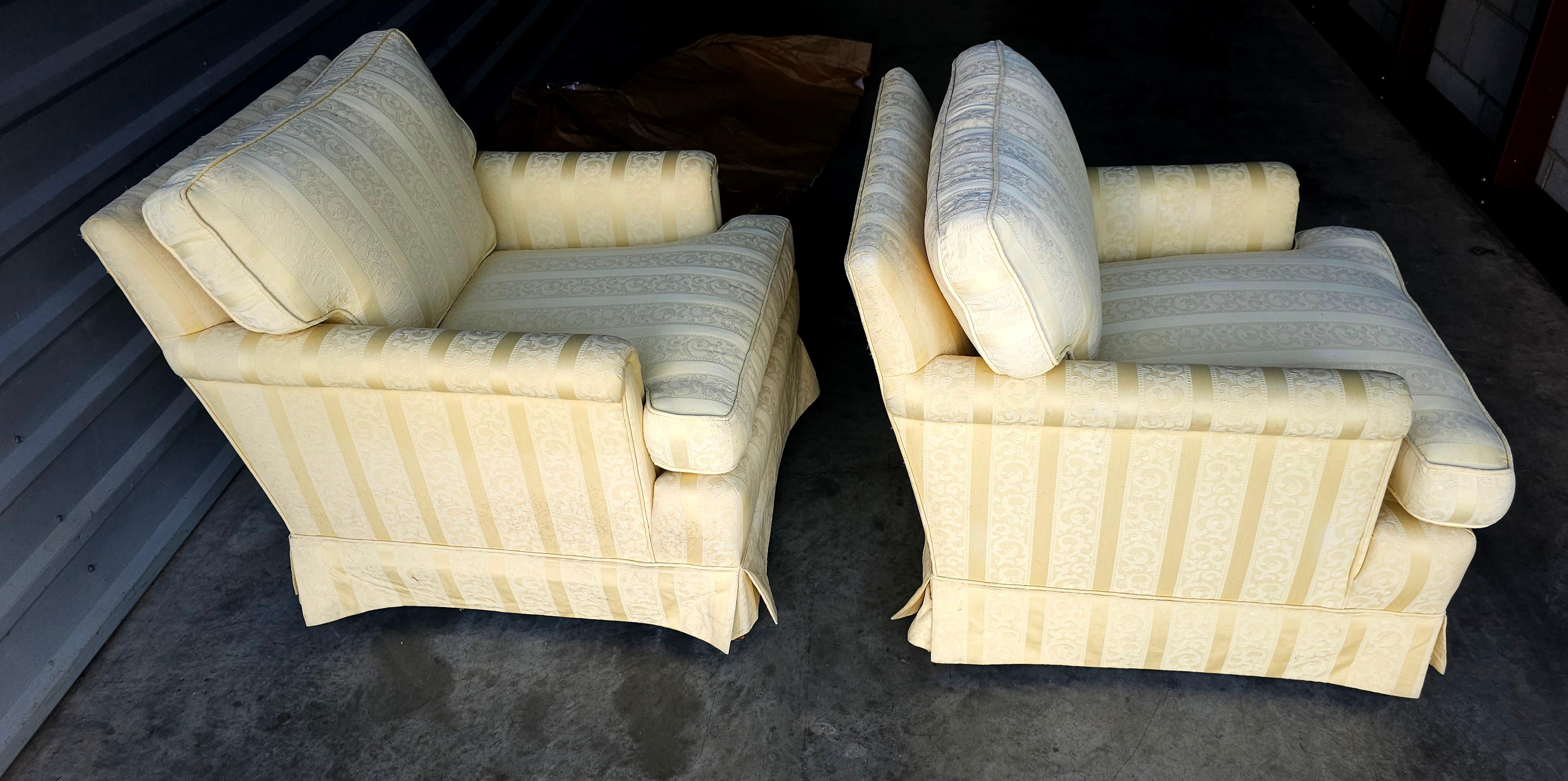 A Pair of Mid 20th Century light Yellow Upholstered Lounge Chairs. Measure 28.5