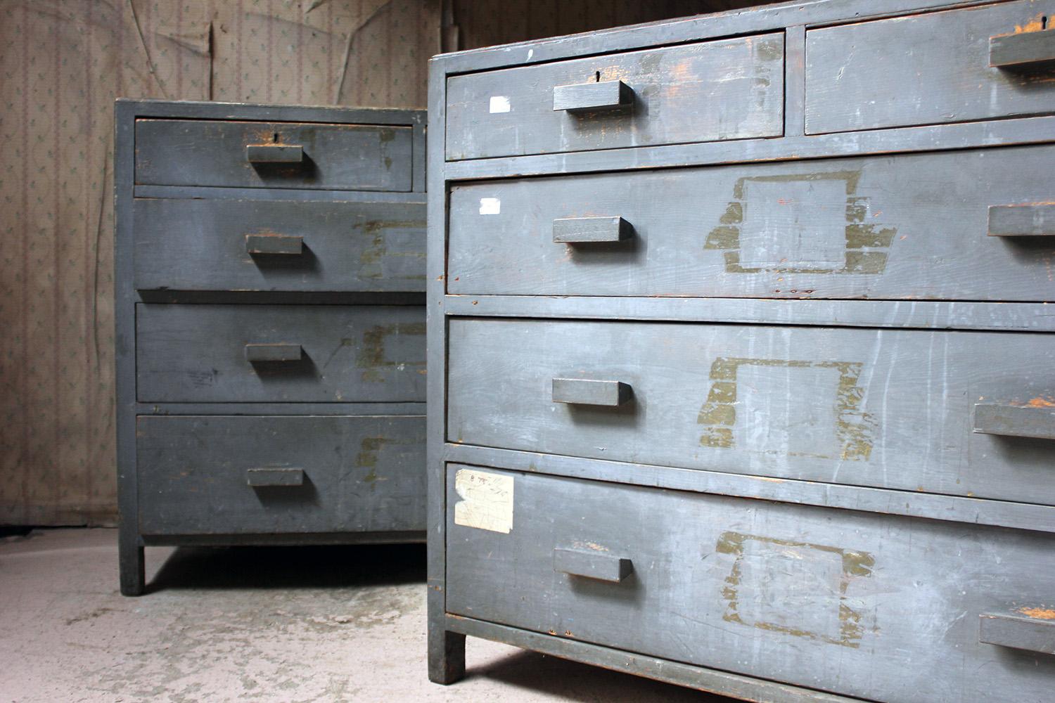 Of good proportions and a super color and texture to the slate primer blue paint, the utilitarian design chests of drawers, sourced from an old art school, one chest in pine, the other in oak, both with pull handles and block feet and each surviving