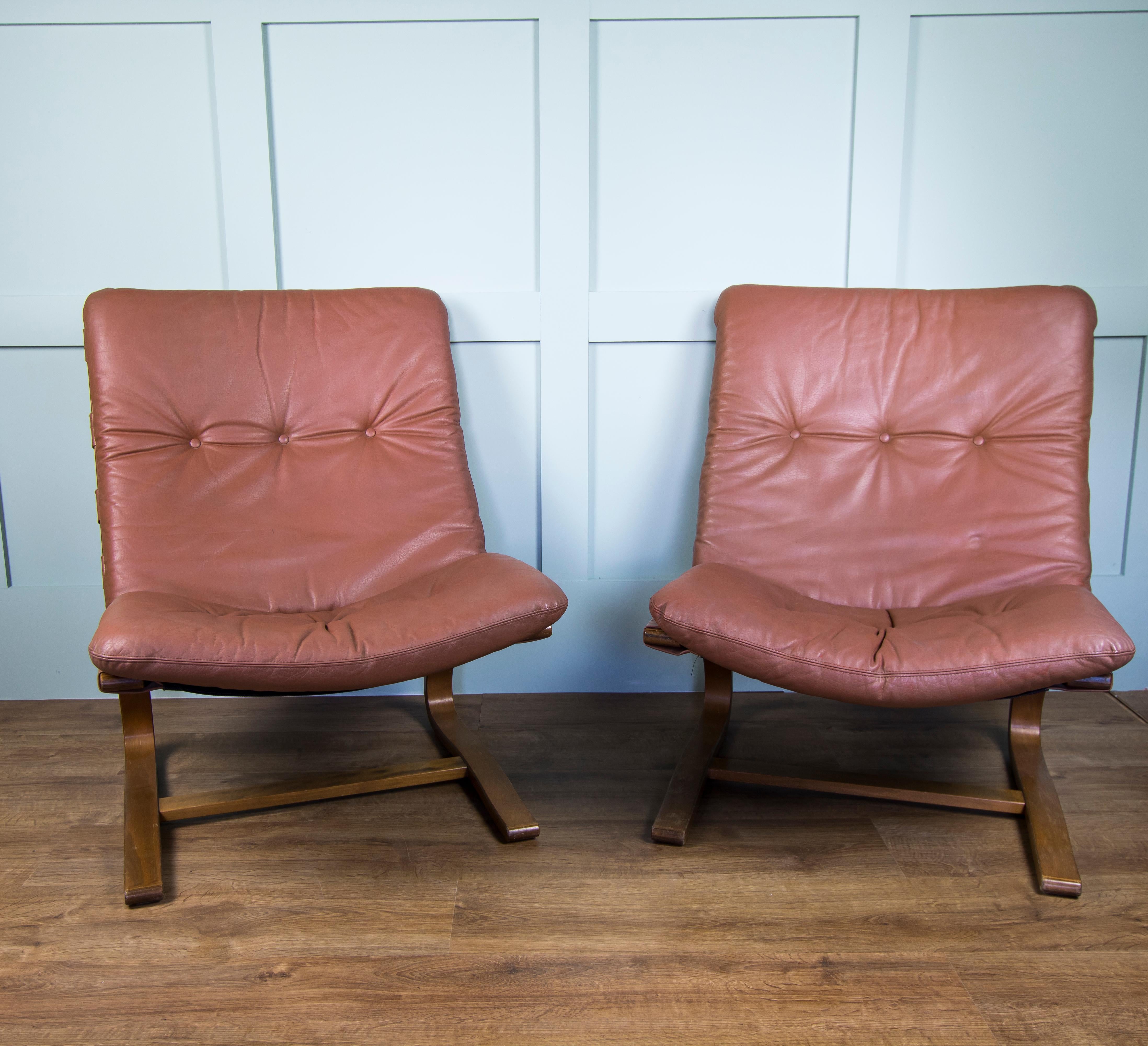 Mid-Century Modern Pair of Mid Brown Leather Elsa & Nordahl Solheim Kengu Armchairs and Footstool For Sale