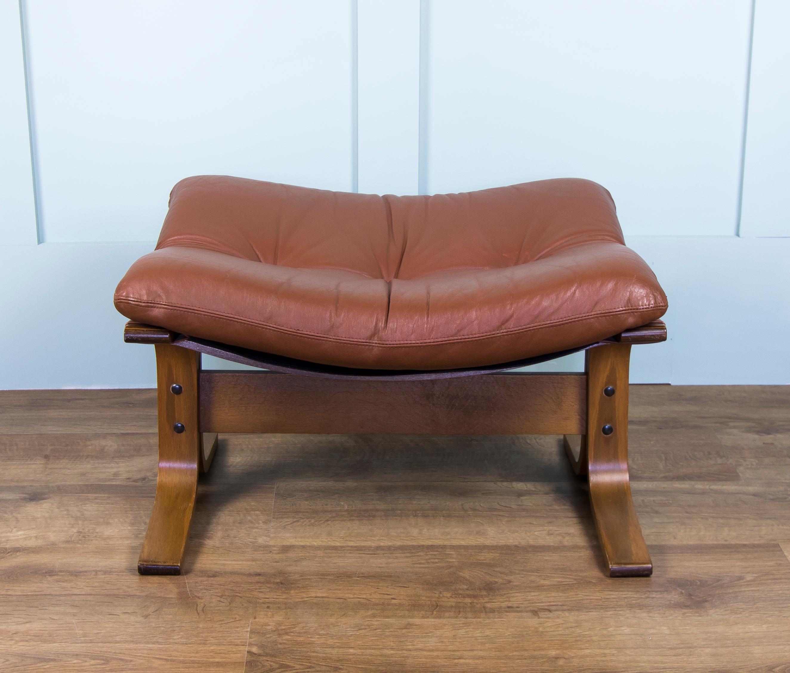 Pair of Mid Brown Leather Elsa & Nordahl Solheim Kengu Armchairs and Footstool In Fair Condition For Sale In Old Romney, Kent