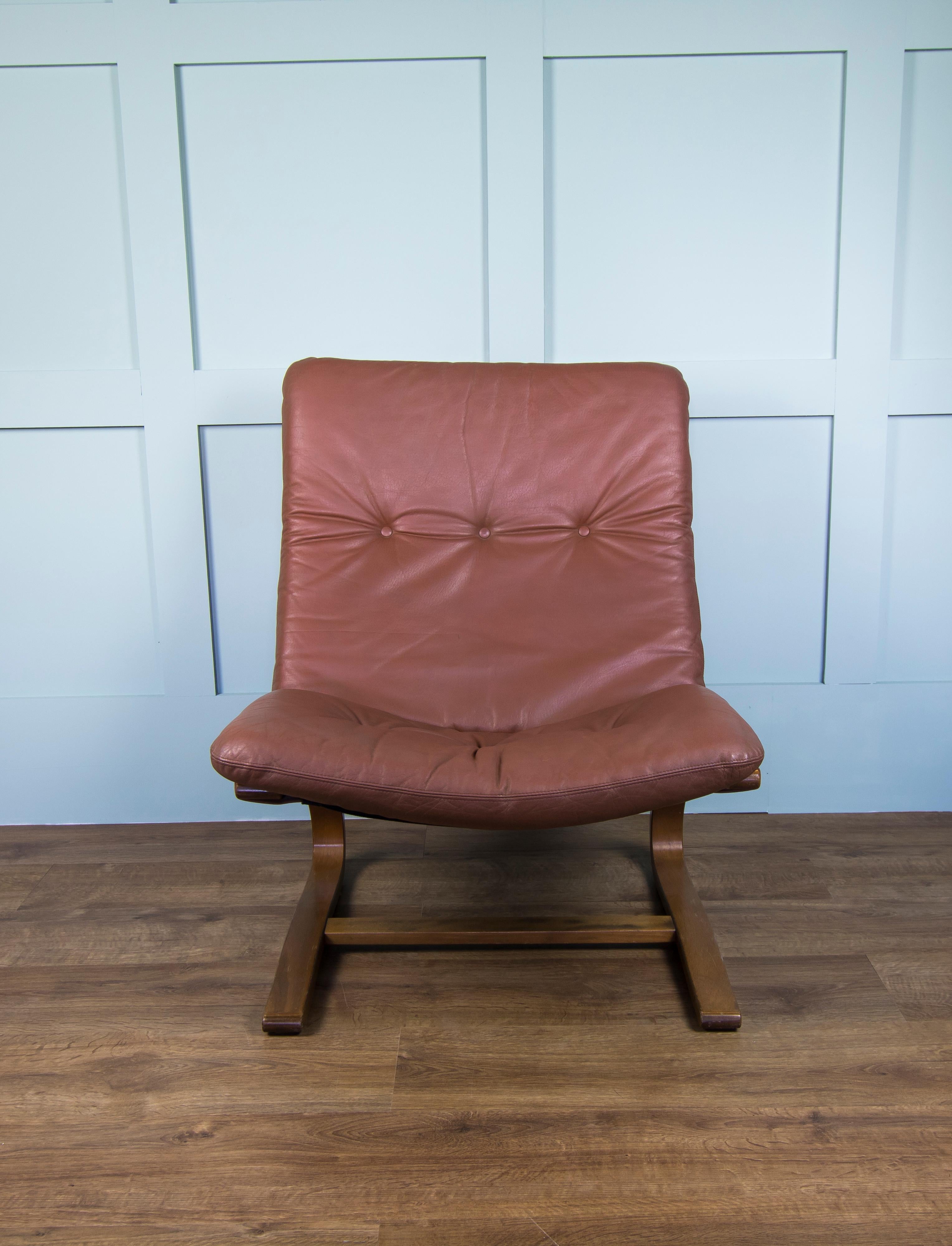 20th Century Pair of Mid Brown Leather Elsa & Nordahl Solheim Kengu Armchairs and Footstool For Sale