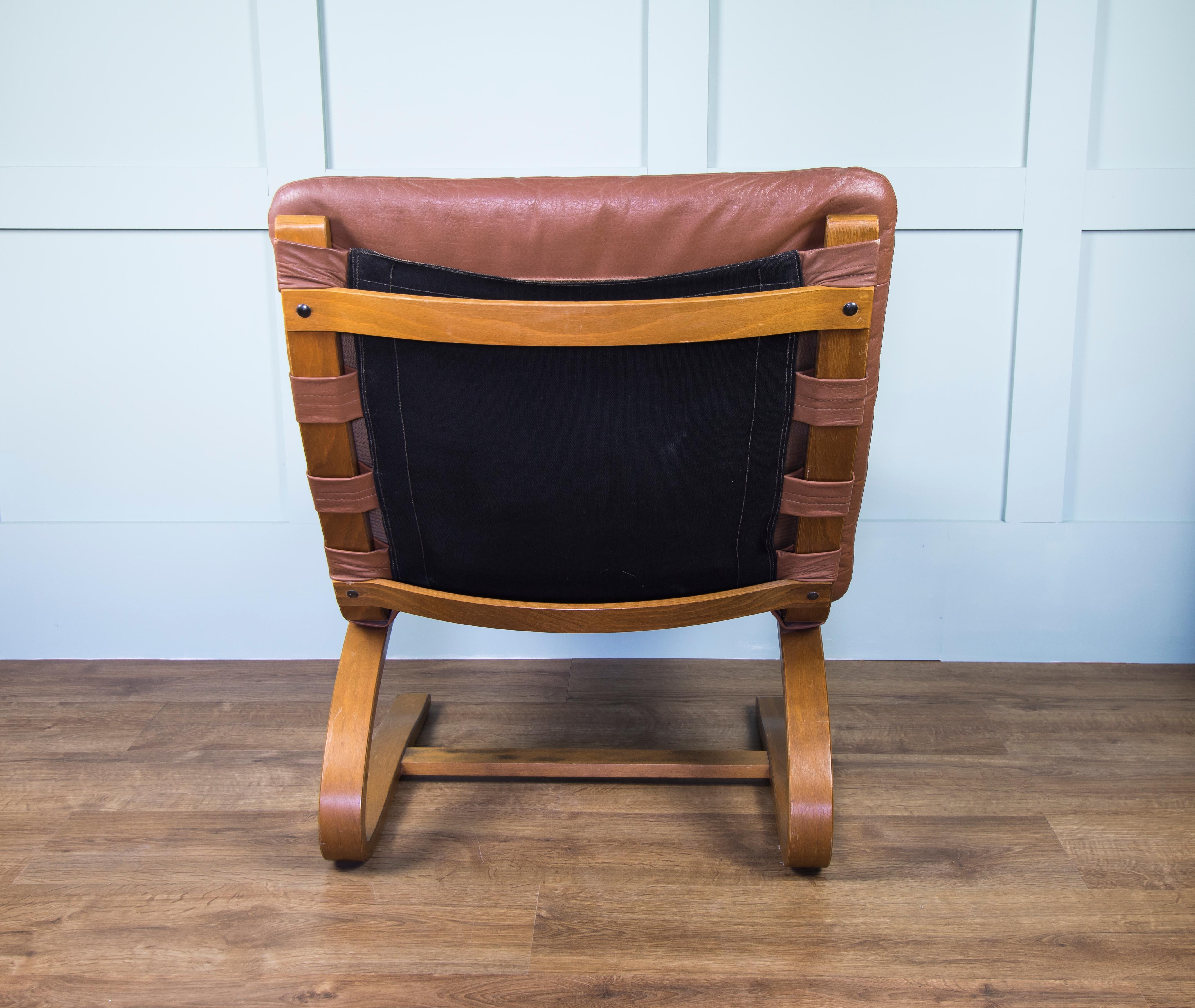 Pair of Mid Brown Leather Elsa & Nordahl Solheim Kengu Armchairs and Footstool For Sale 1