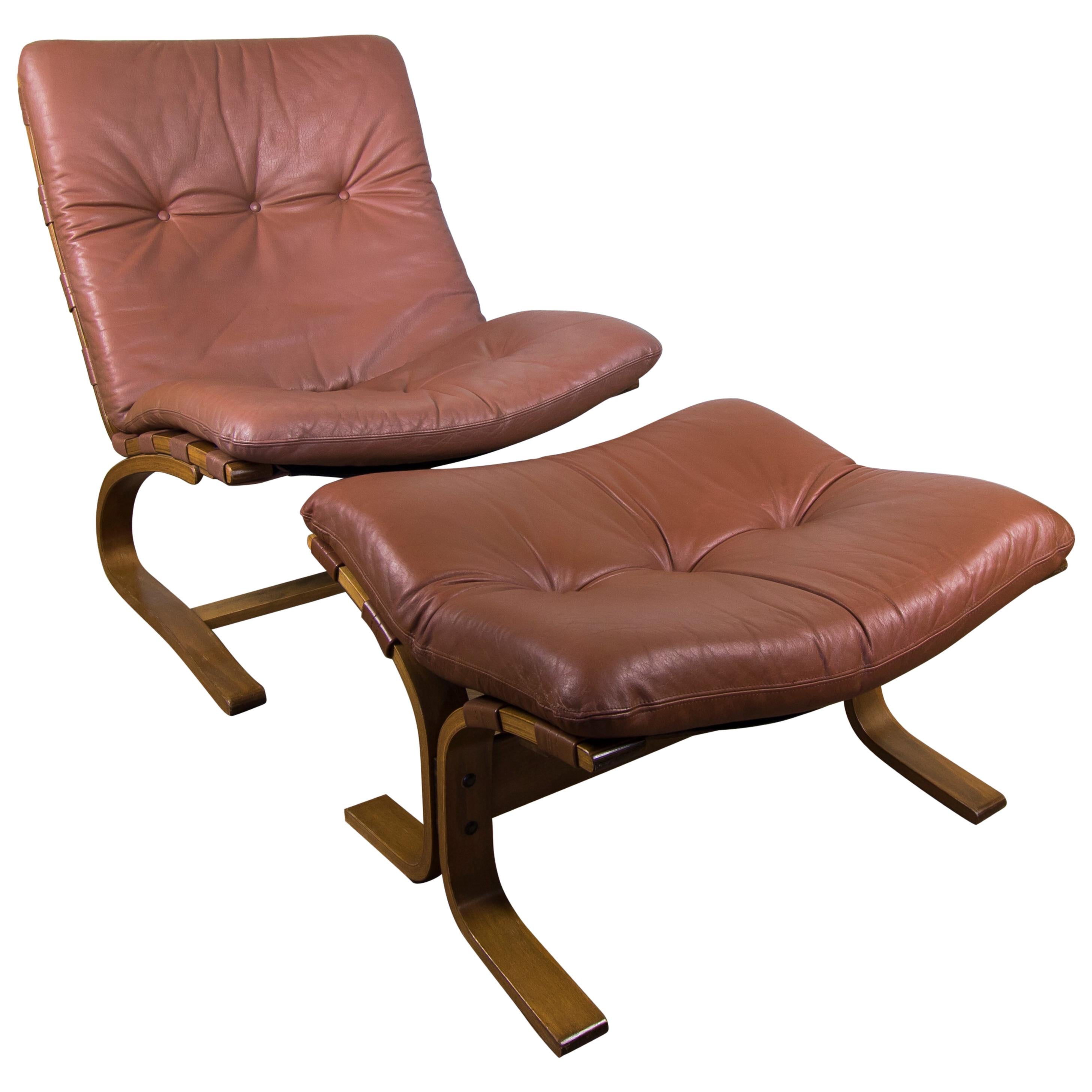 Pair of Mid Brown Leather Elsa & Nordahl Solheim Kengu Armchairs and Footstool For Sale