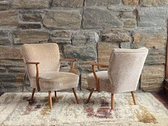 Pair of mid century 1950's Scandinavian cocktail armchairs with new upholstery