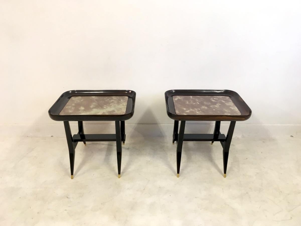 A pair of side tables

Rosewood frame

Marble insert

By Giuseppe Scapinelli

Brazilian, 1960s.