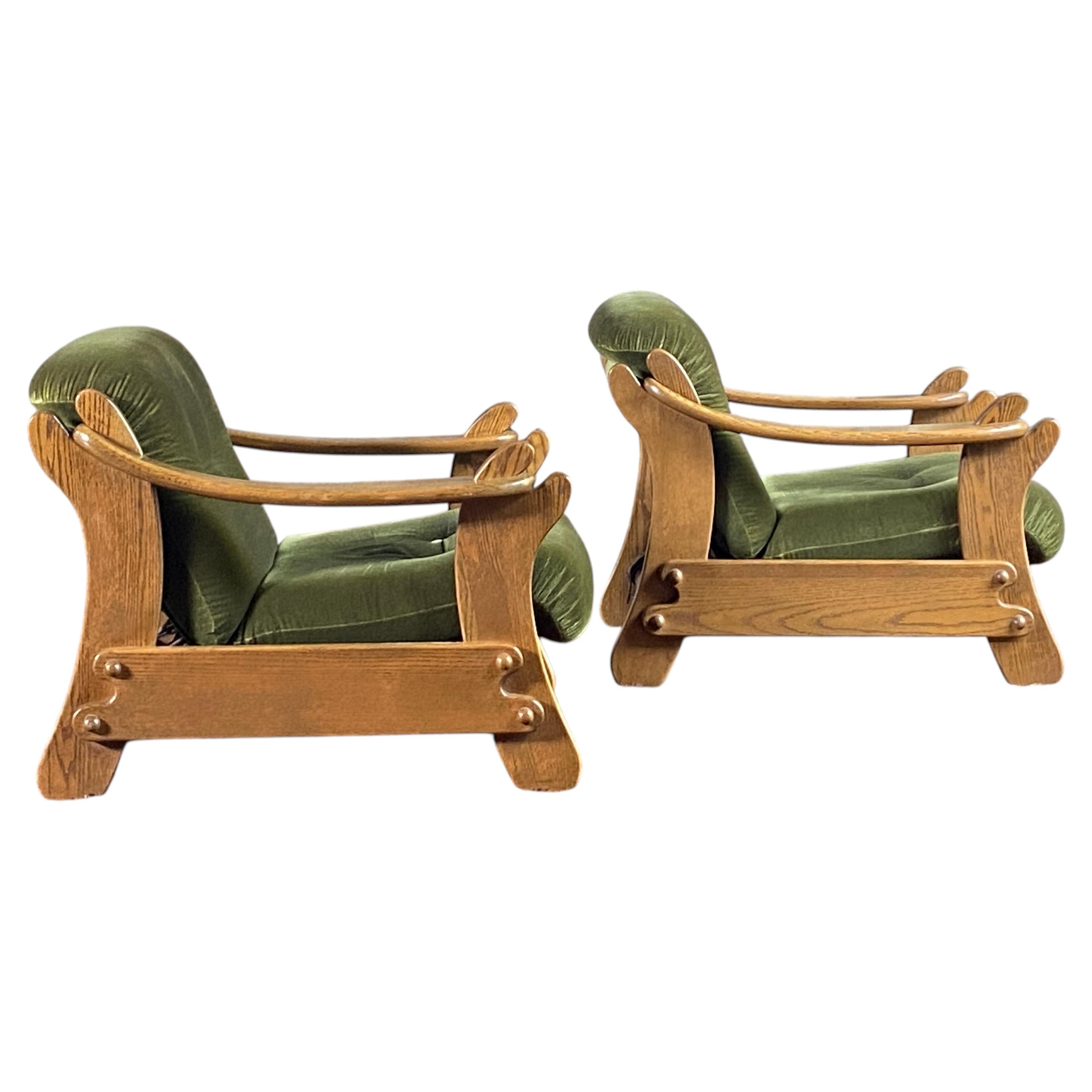 Pair of mid century 1970's sculptural Dutch Brutalist oak lounge chairs