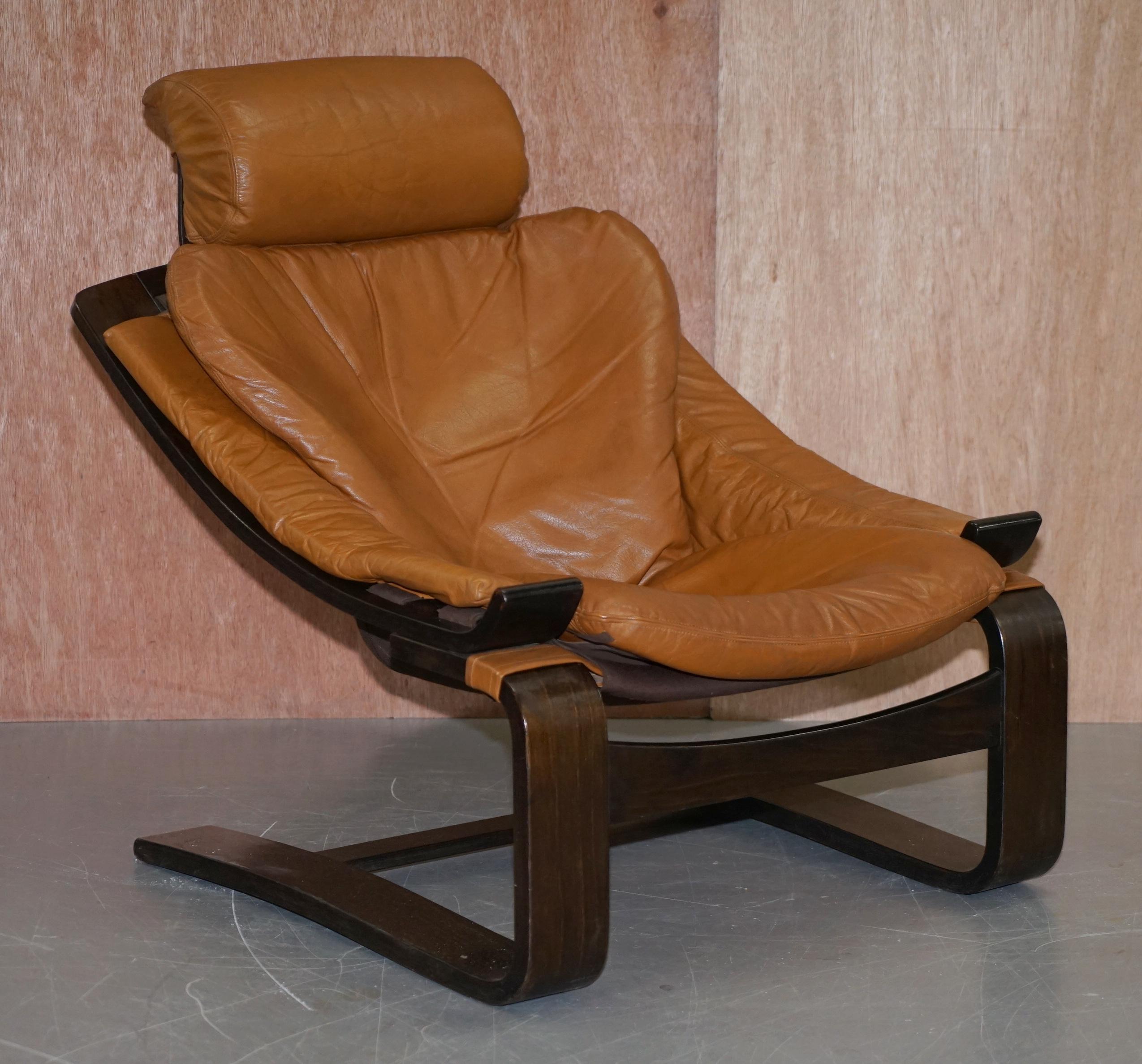 Nous sommes ravis d'offrir à la vente cette paire de fauteuils vintage Nelo Mobel Kroken en cuir brun cognac de style suédois du milieu du siècle dernier, créés par le génie d'Ake Fribytter.

Ces chaises sont à peu près aussi confortables que vous