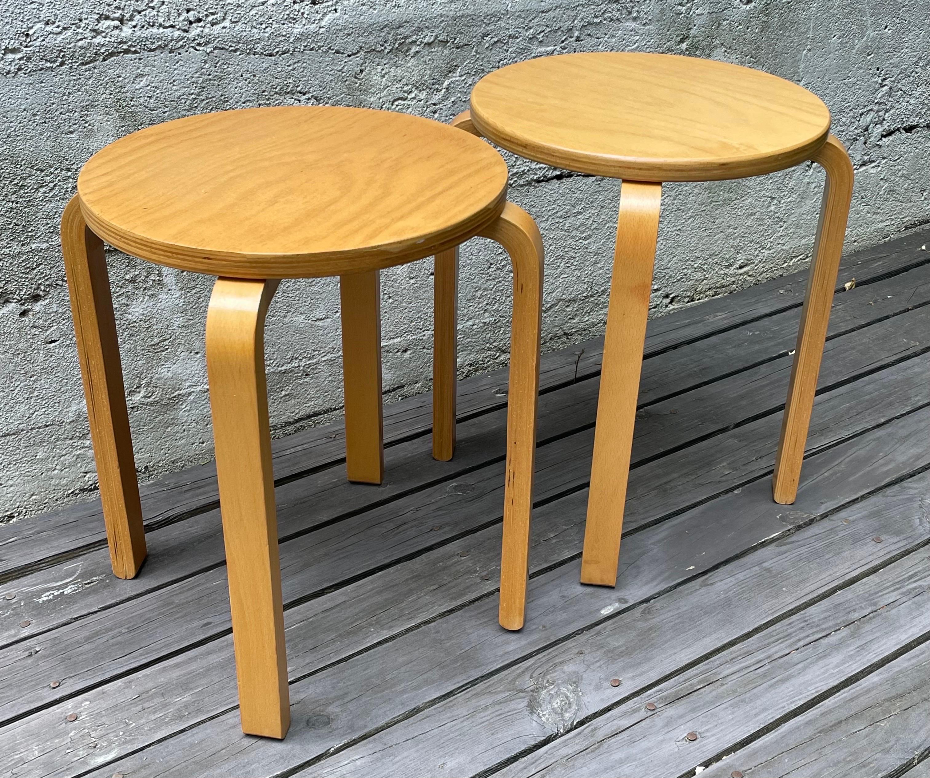 Pair of Mid Century Alvar Aalto Model 60 birch nesting side tables or stools, made in Romania.