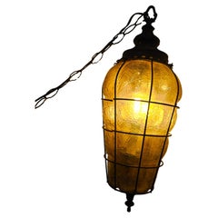 Pair of Mid-Century Amber Crackle Glass Spanish Pendant Lamps Blown in Iron