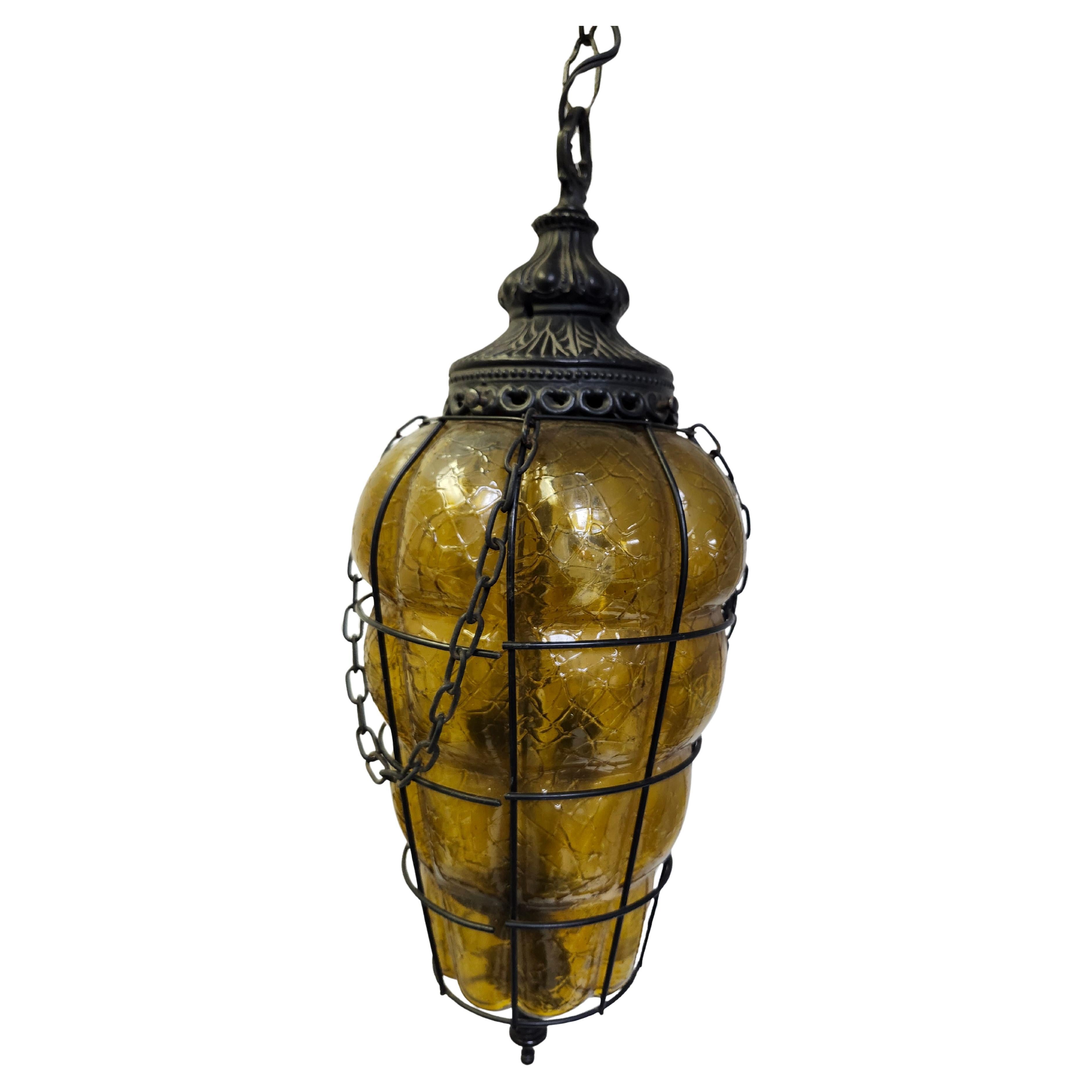 Pair of Mid-Century Amber Crackle Glass Spanish Pendant Lamps Blown in Iron For Sale