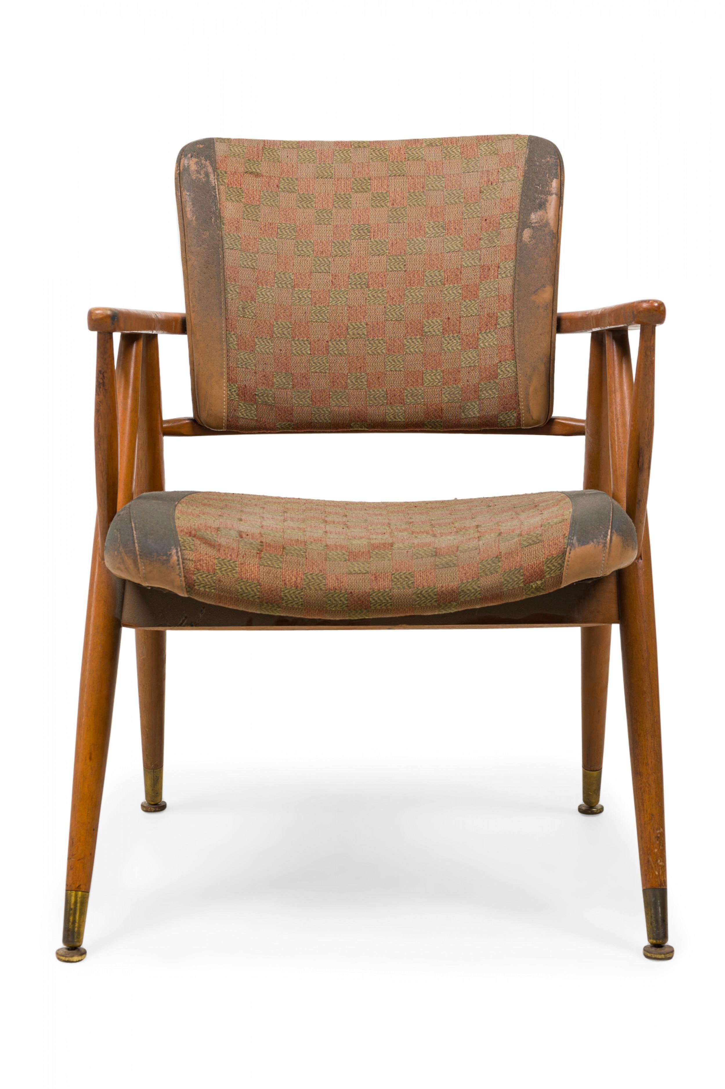 PAIR of midcentury American armchairs with shaped horseshoe arms unified with the backrest as one piece, a contoured horizontal back support, shaped back and seat cushions upholstered in a beige and gray checkerboard patterned suede / fabric