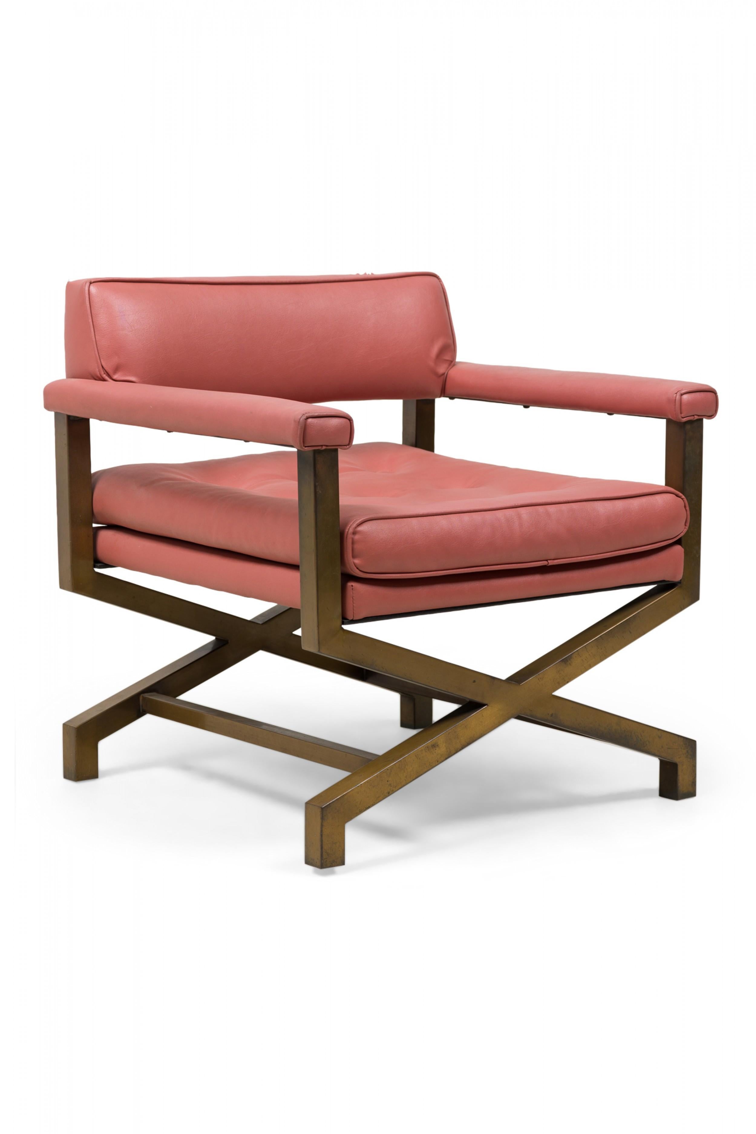 PAIR of Midcentury American campaign / armchairs with an X-form metal frame with brushed brass finish and low backs, upholstered in dark pink / mauve leather with button tufted seats (PRICED AS PAIR) (attributed to TOMMI PARZINGER).