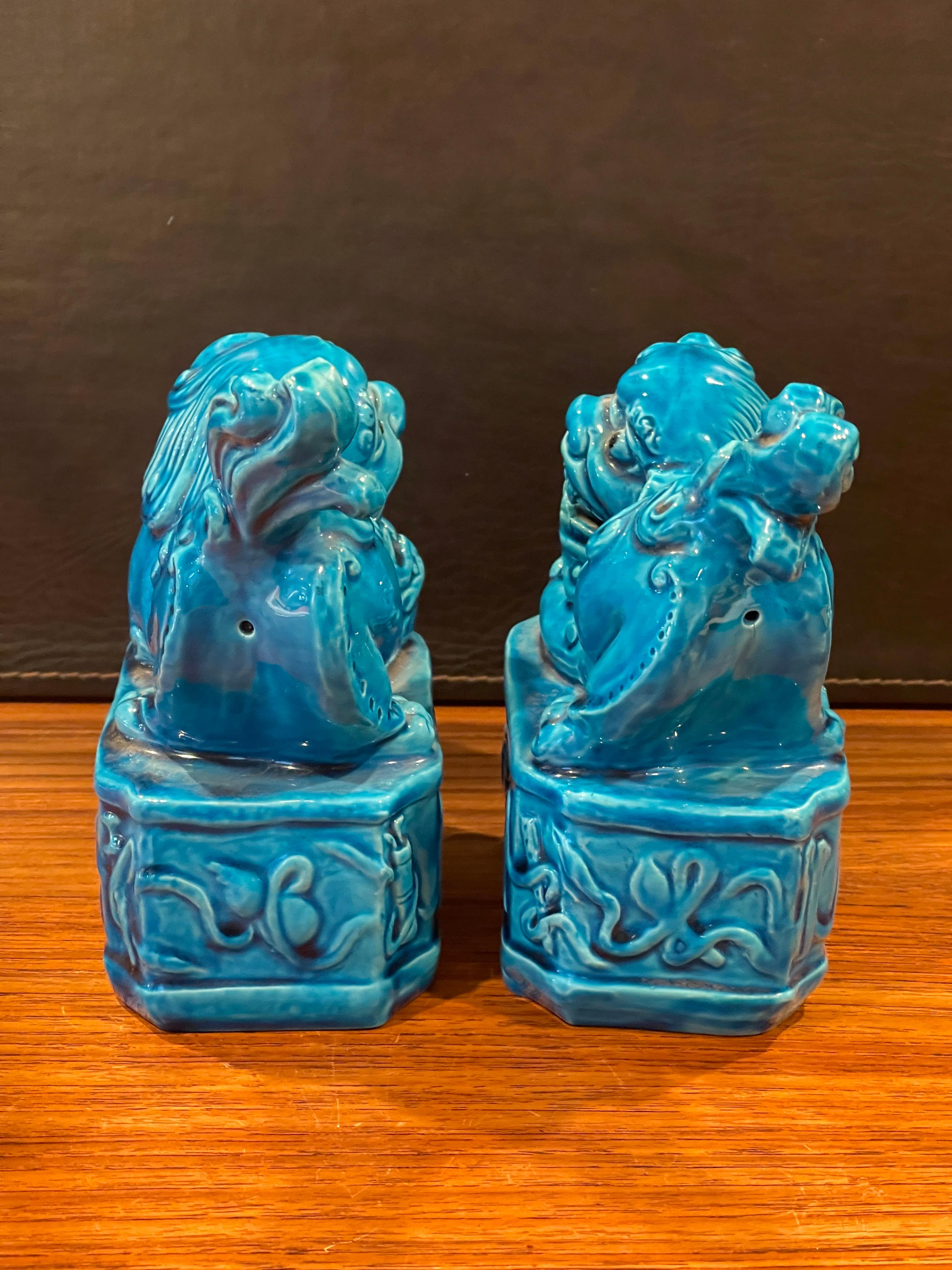 Chinese Pair of Mid-Century Aqua Ceramic Foo Dogs / Bookends For Sale