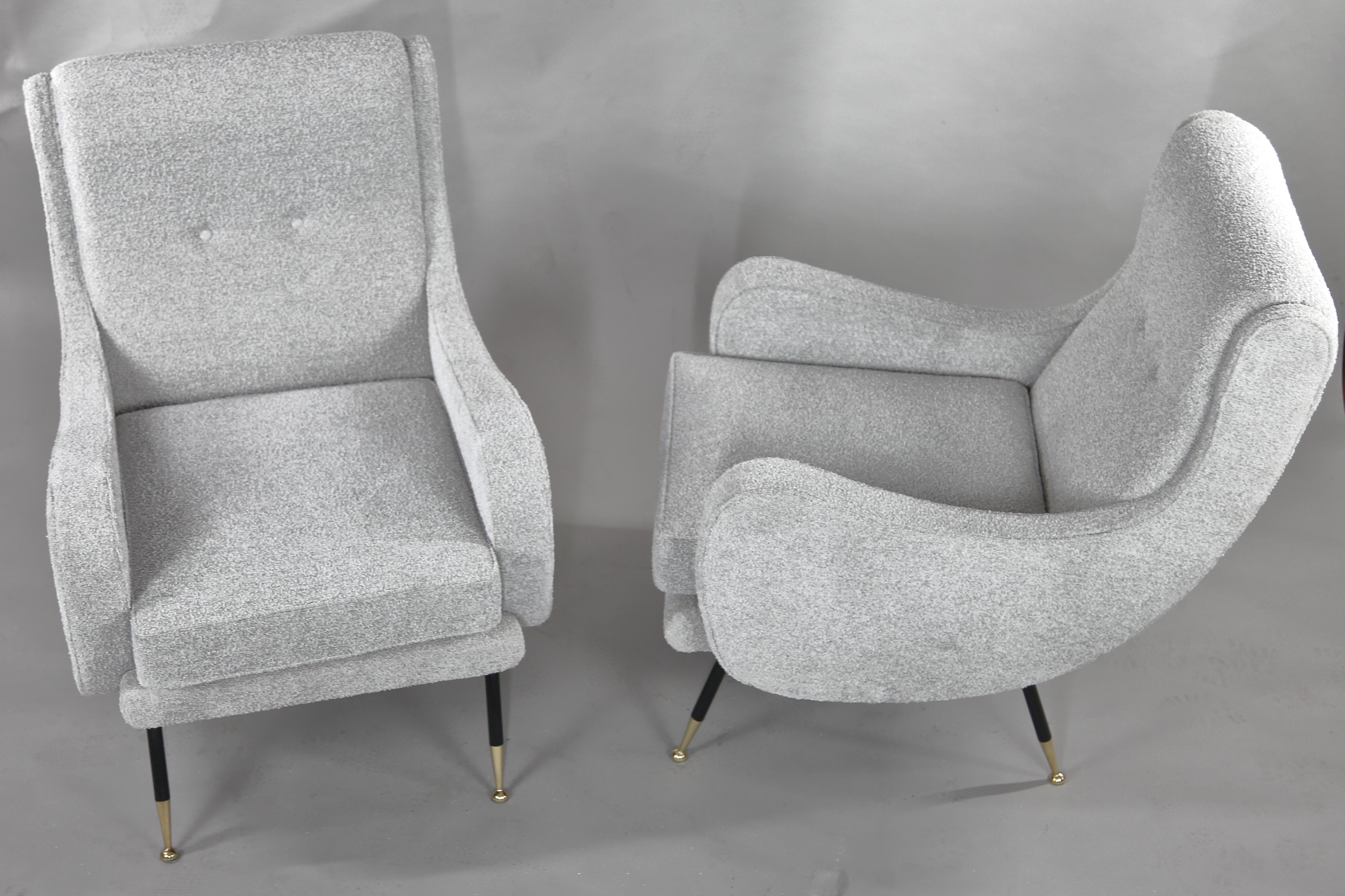 Pair of mid-century armchairs, Italy 1970s, entirely restored and reupholstered with a boucle‘ by Romo (Gobi)