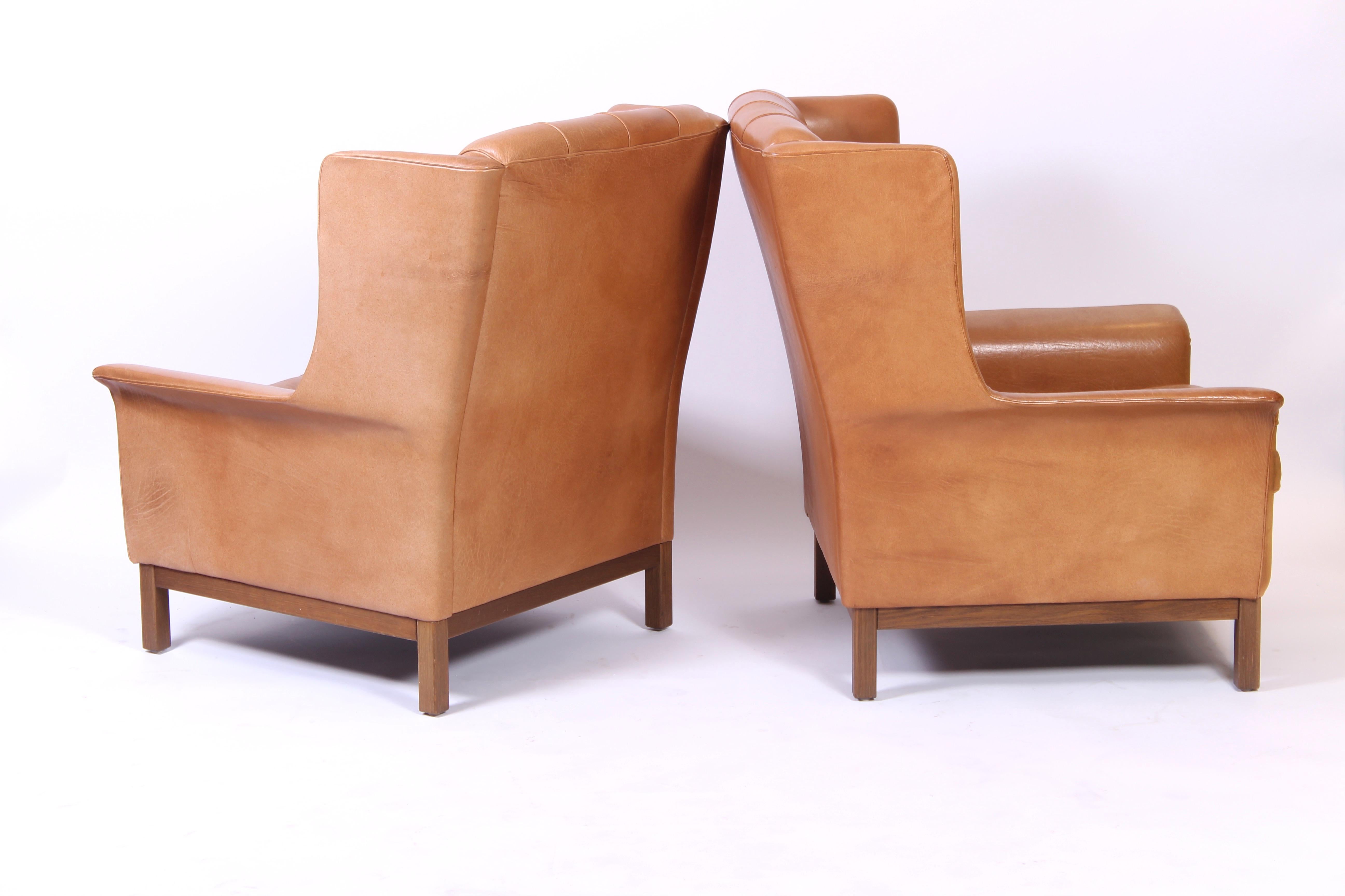 Pair of Midcentury Arne Norell Lounge Chairs with Ottoman, 1960s In Good Condition For Sale In Malmo, SE