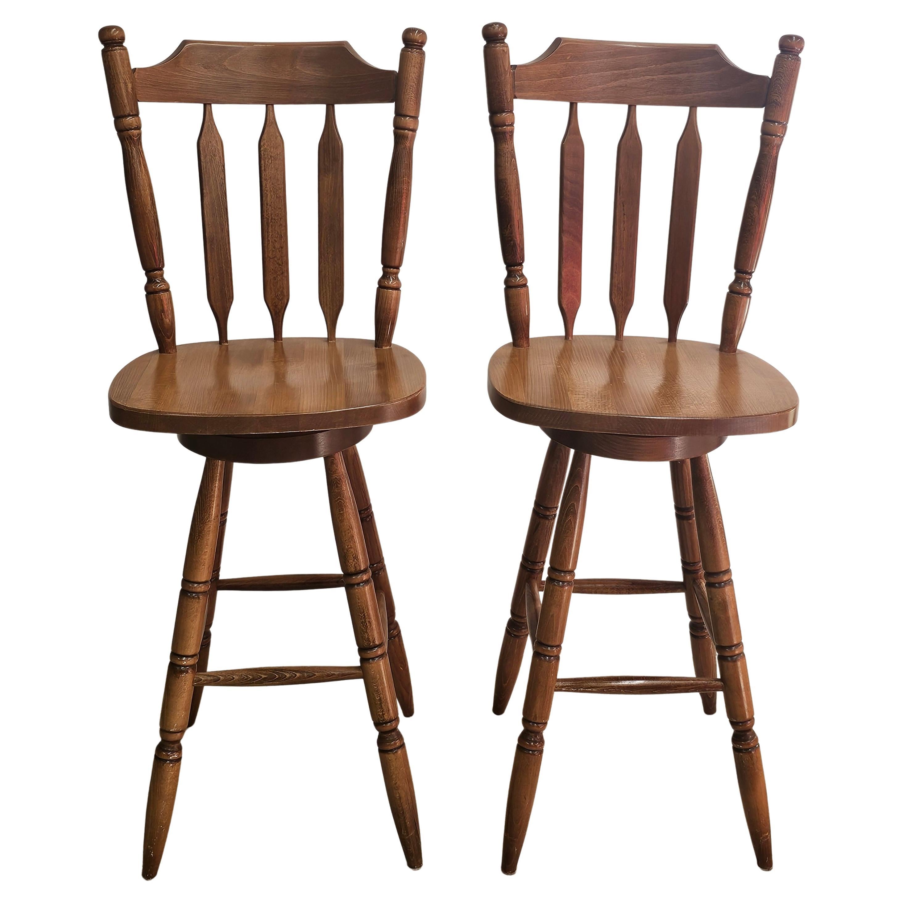 Pair of Mid Century Arts and Crafts Style Stained Maple Swivel Bar Stools