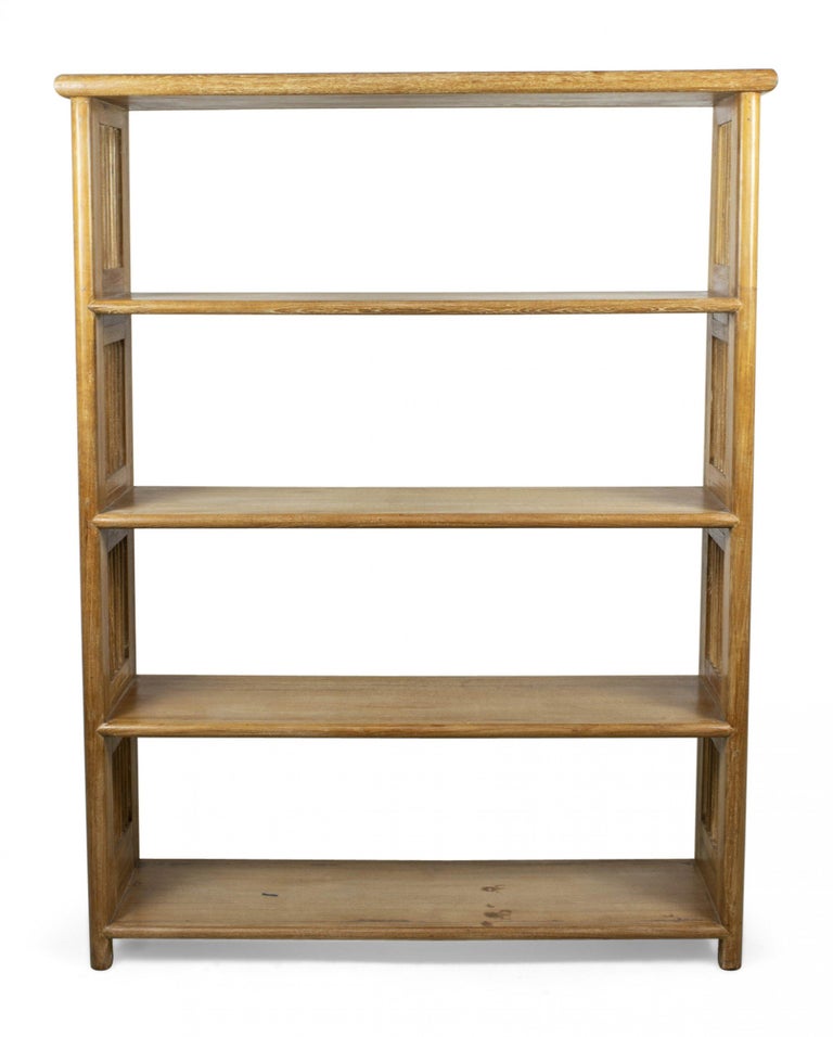 Pair of mid-century (1940s) Austrian style open bookcases / etageres in cerused oak with 4 shelves, carved and beveled sides and dowel connecting joint construction.