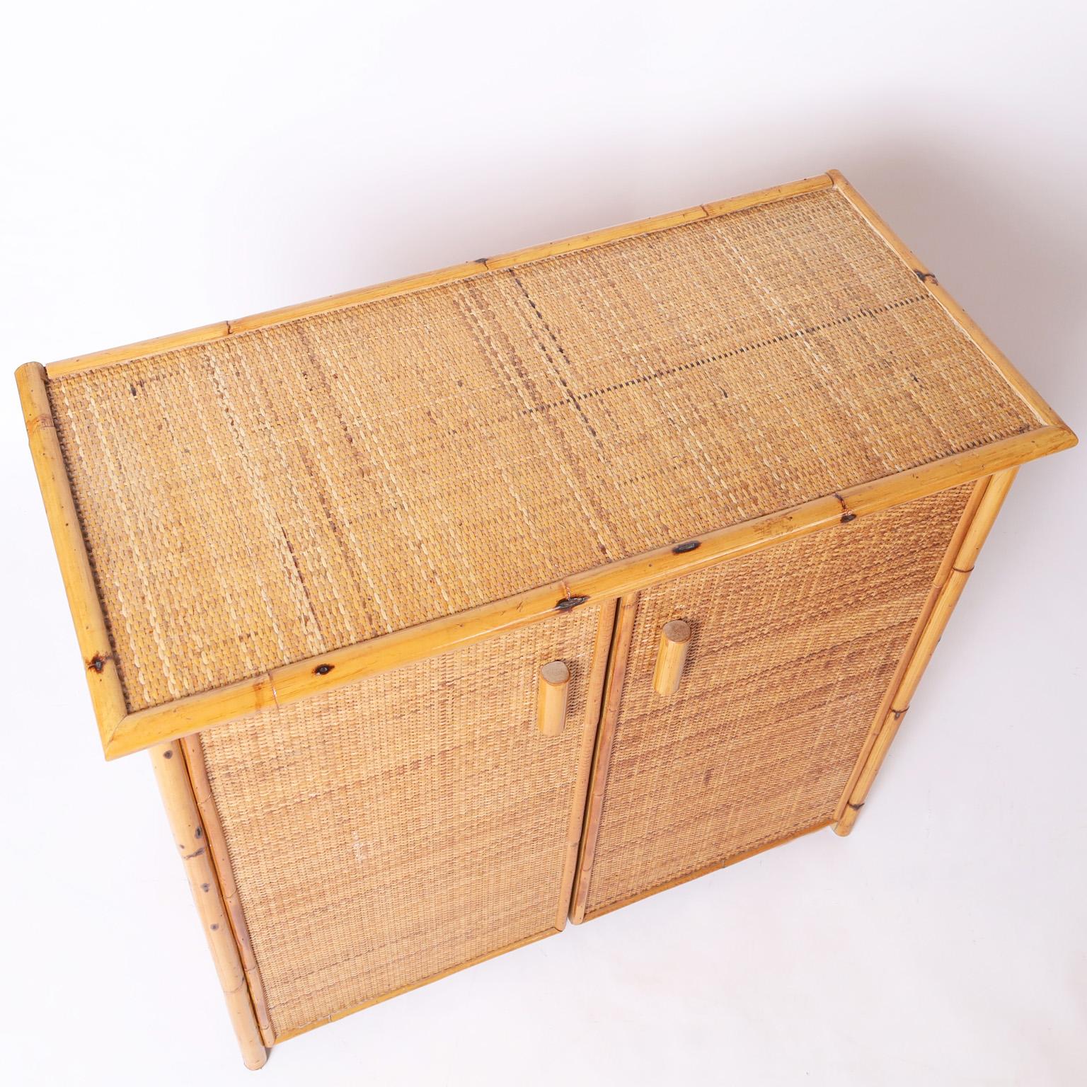 20th Century Pair of Mid-Century Bamboo and Grasscloth Cabinets or Servers For Sale