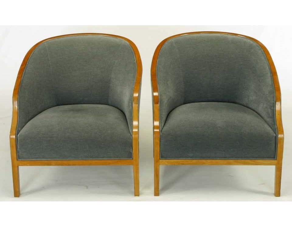Striking pair of club chairs designed by Ward Bennett for Brickel Associates. Featuring a graceful curving banded frame, with a light oak finish and professionally upholstered in velvet.

Quite simply, there is no area of art and design in which