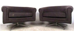 Pair of Mid-Century Barrel Back Swivel Lounge Chairs by Selig