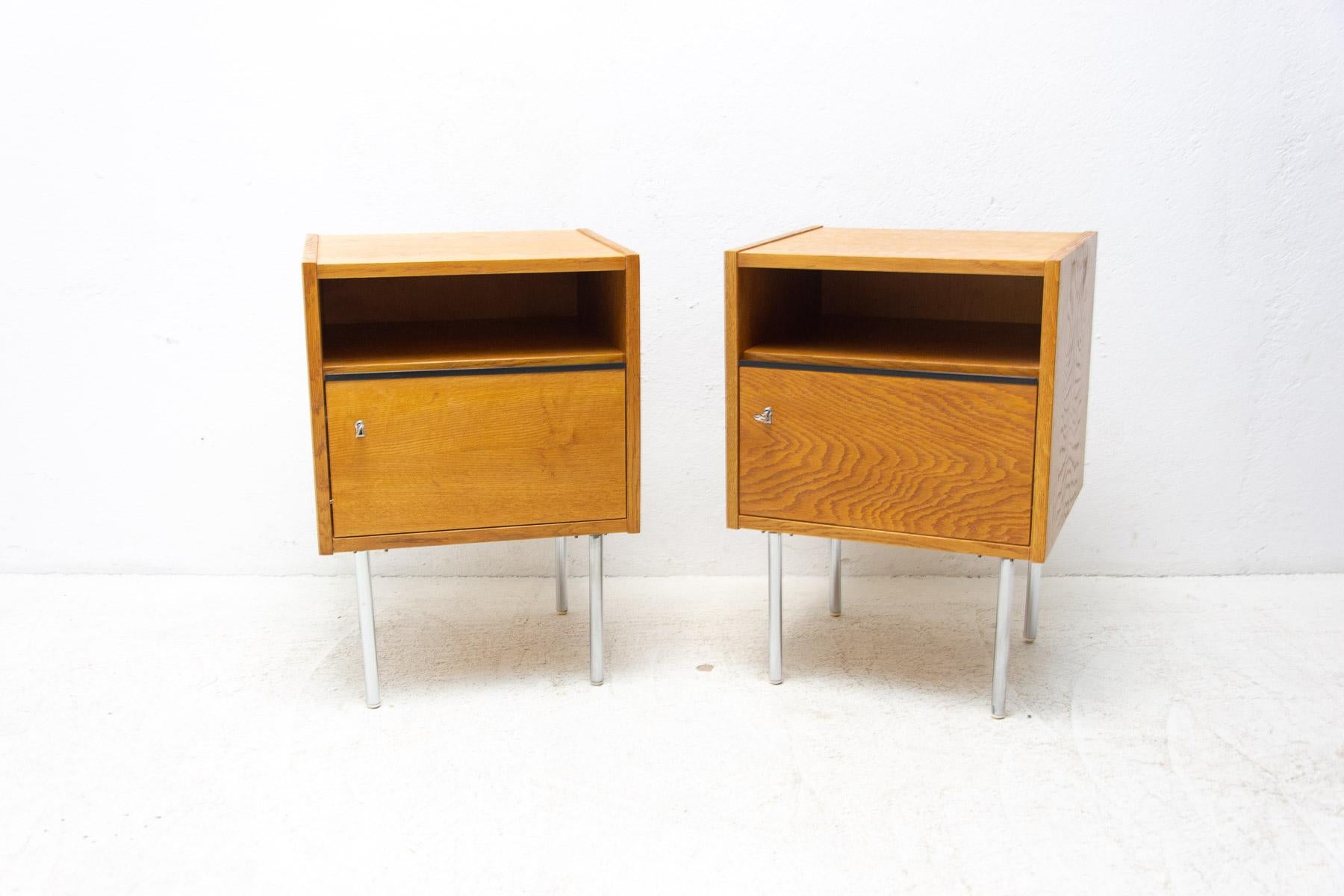 A pair of minimalist bedside tables (night stands) made in the former Czechoslovakia in the 1960´s.

Outstanding timeless design. Made of beech wood, chrome legs. Renovated.

In excellent condition.

Price is for the pair.

Height: 65 cm

Width: 45