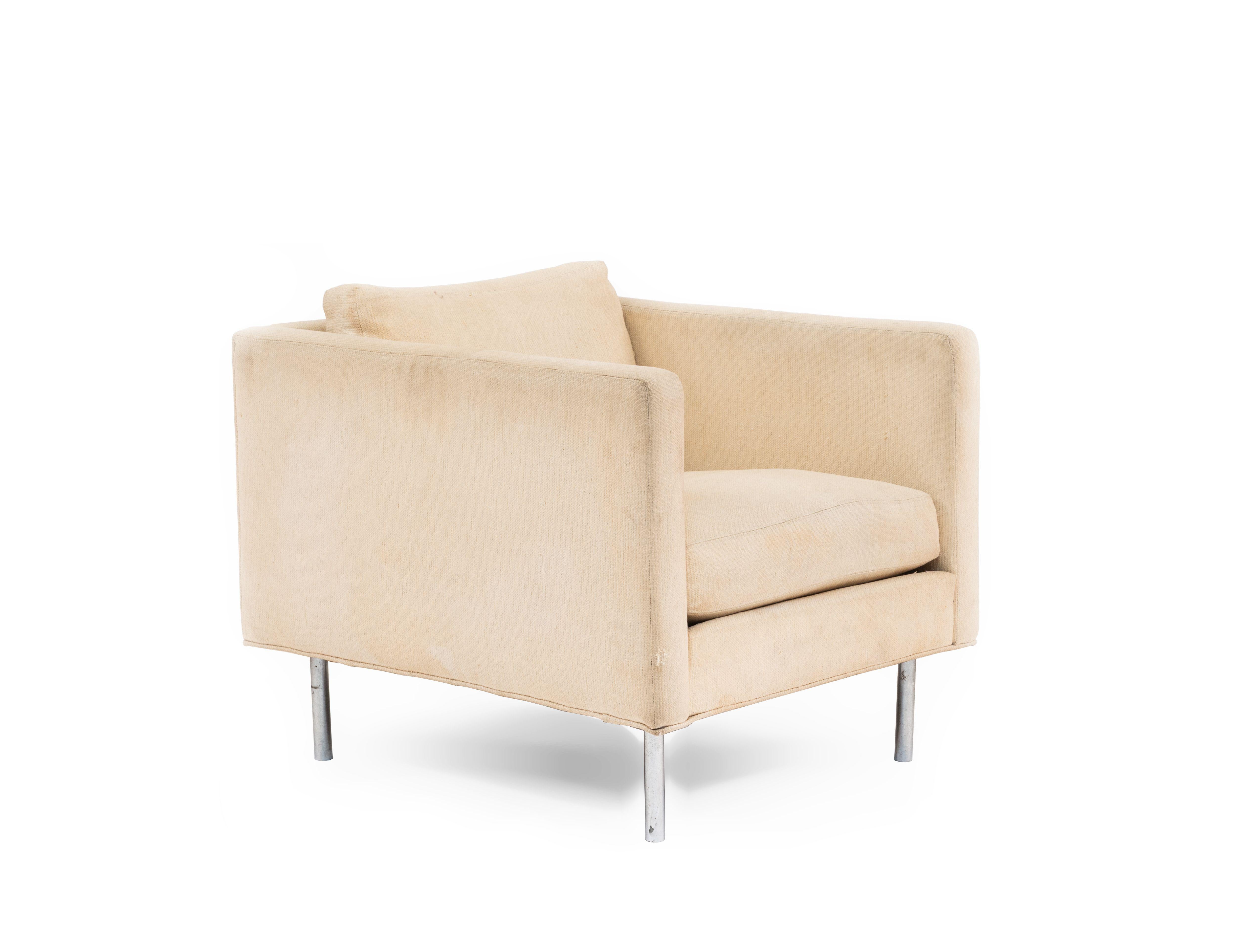 Pair of American Mid-20th Cent cube form off-white upholstered Armchairs supported on chrome feet (designed by MILO BAUGHMAN, labeled: James Inc )
