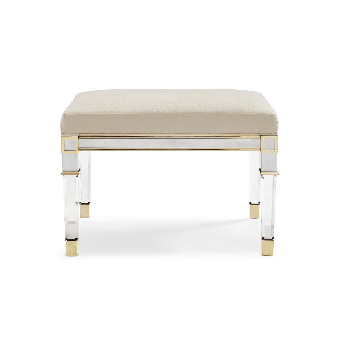 Inspired by a 19th-century Italian Empire design, nickel, gold bullion and acrylic merge in this petite bench with enormous style. The bench frame and tops of the Italian square tapered legs are finished in polished Nickel framed in Gold
