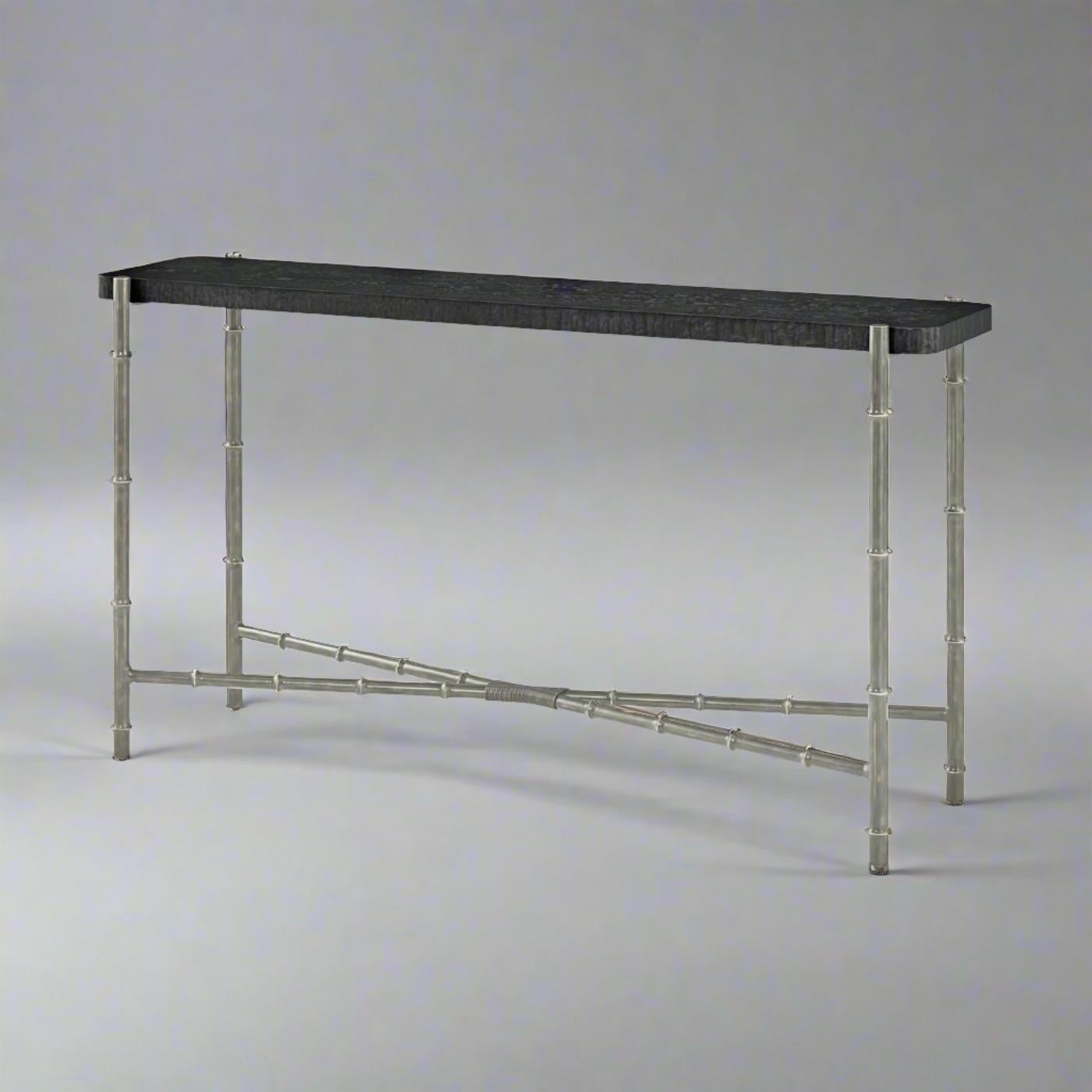 A perfect fusion of timeless elegance and modern sophistication. The exquisite Tamo ash burl wood top, featuring unique grain patterns and finished in a dark Silent Black, brings a touch of natural beauty, while the Brass bamboo-inspired base adds a
