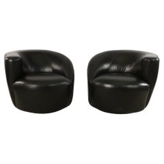 Pair of Mid-Century Black Leather Nautilus Swivel Armchairs