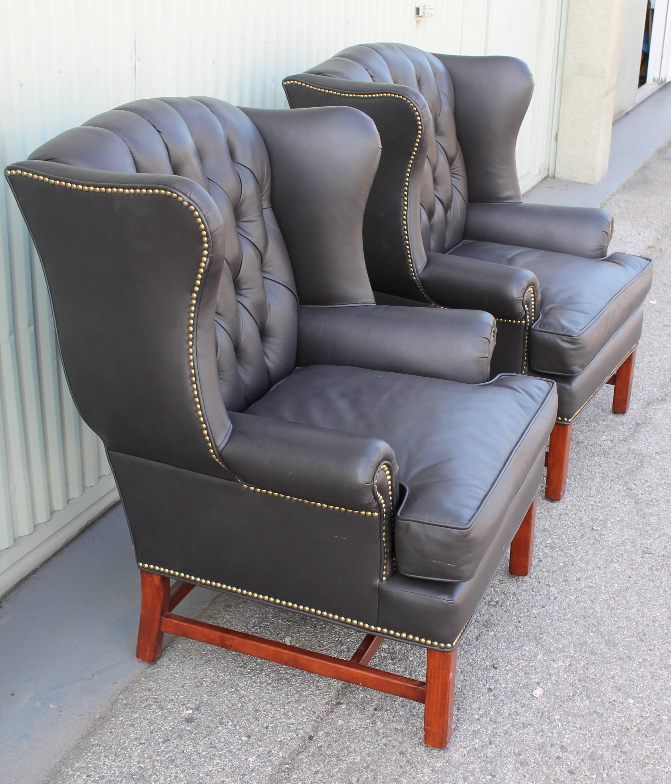 Hand-Crafted Pair of Midcentury Black Leather Wing Chair