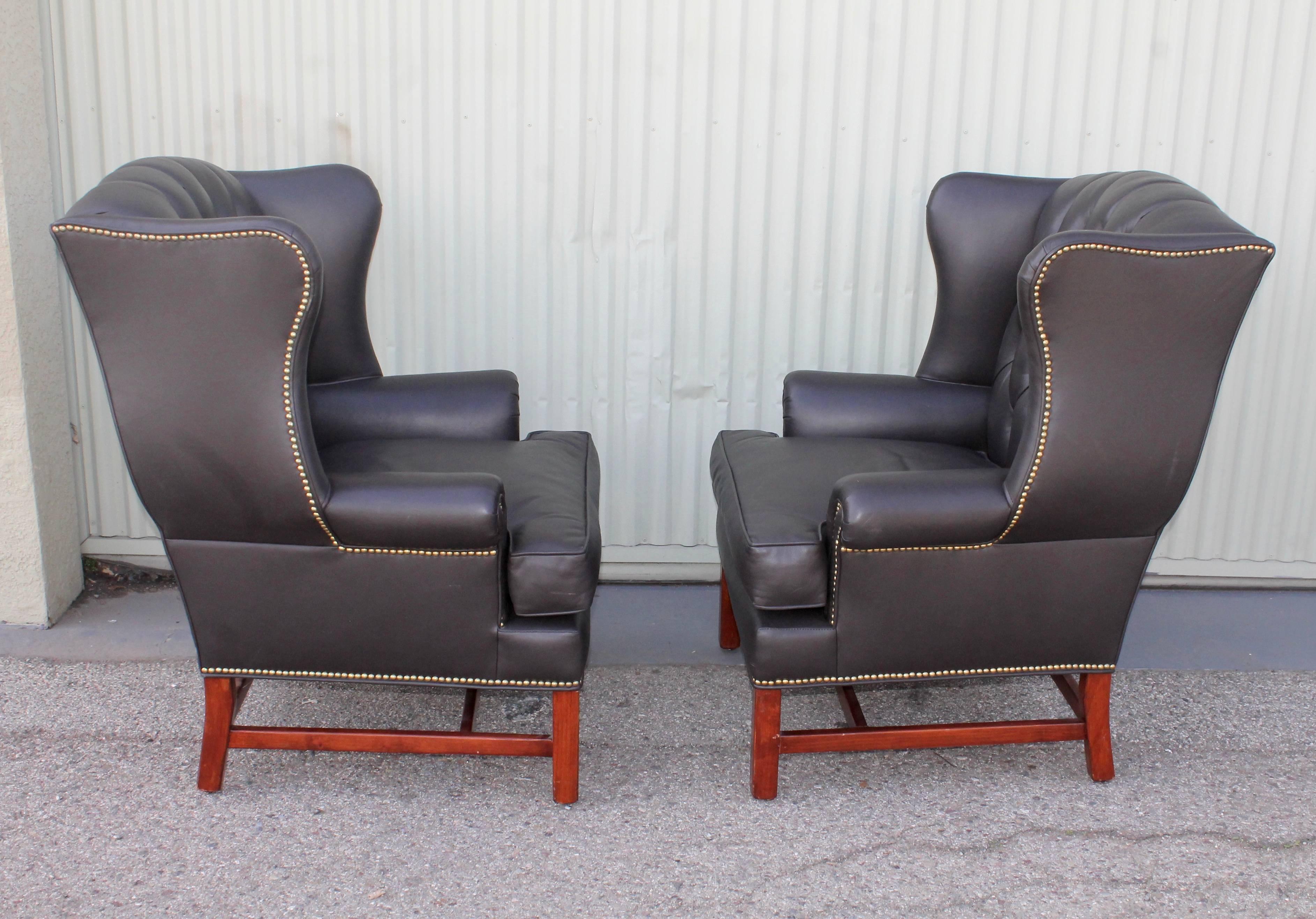 Pair of Midcentury Black Leather Wing Chair In Excellent Condition In Los Angeles, CA