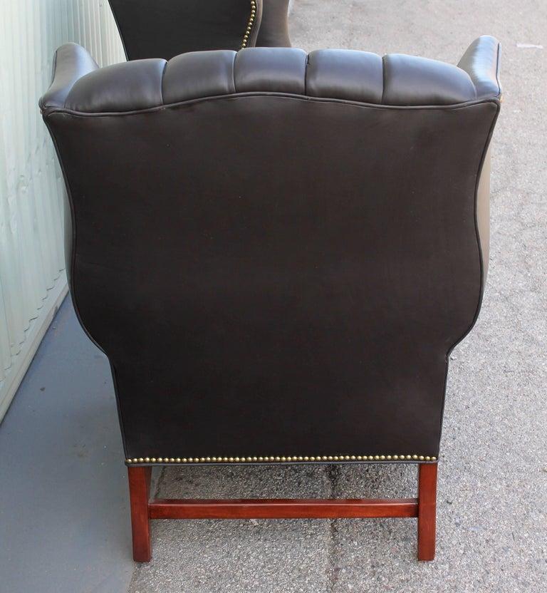 Pair of Mid-Century Black Leather Wing Chair In Excellent Condition In Los Angeles, CA