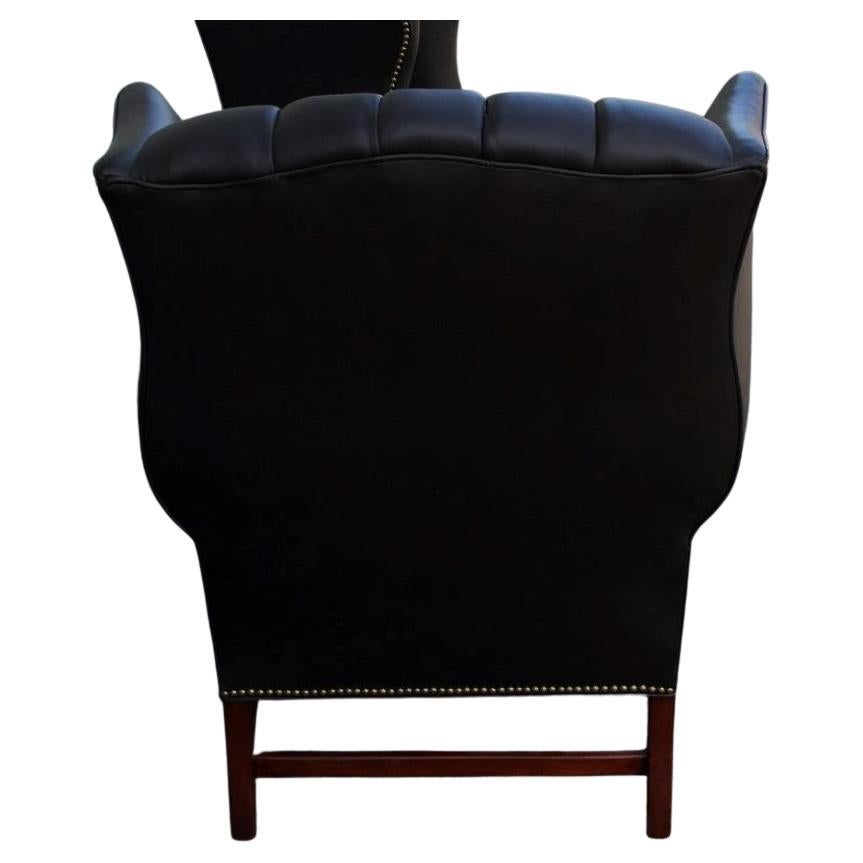 Pair of Mid-Century Black Leather Wing Chair In Excellent Condition In Los Angeles, CA