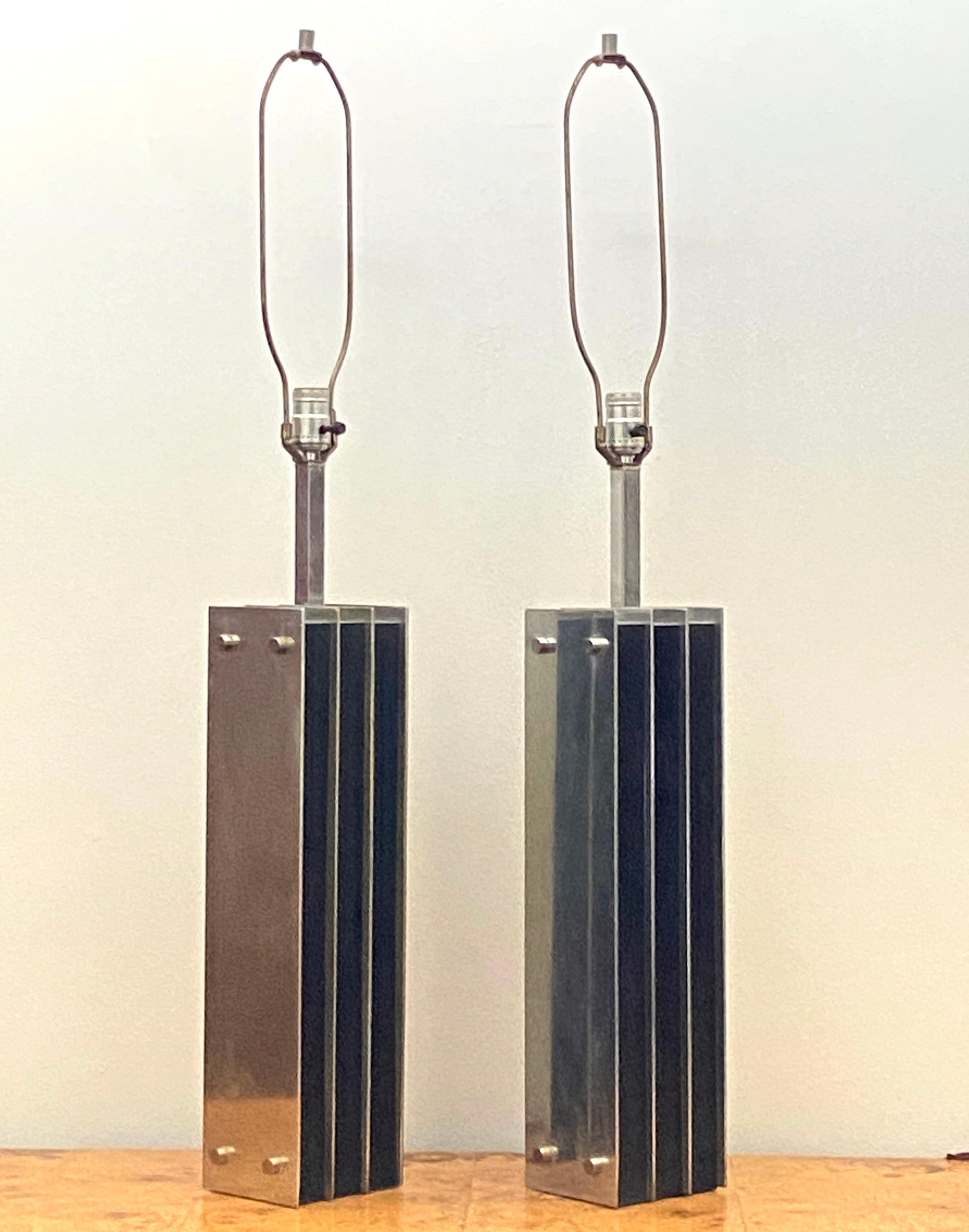 Great pair of steel and black oak Laurel lamps.
The measurement of  40