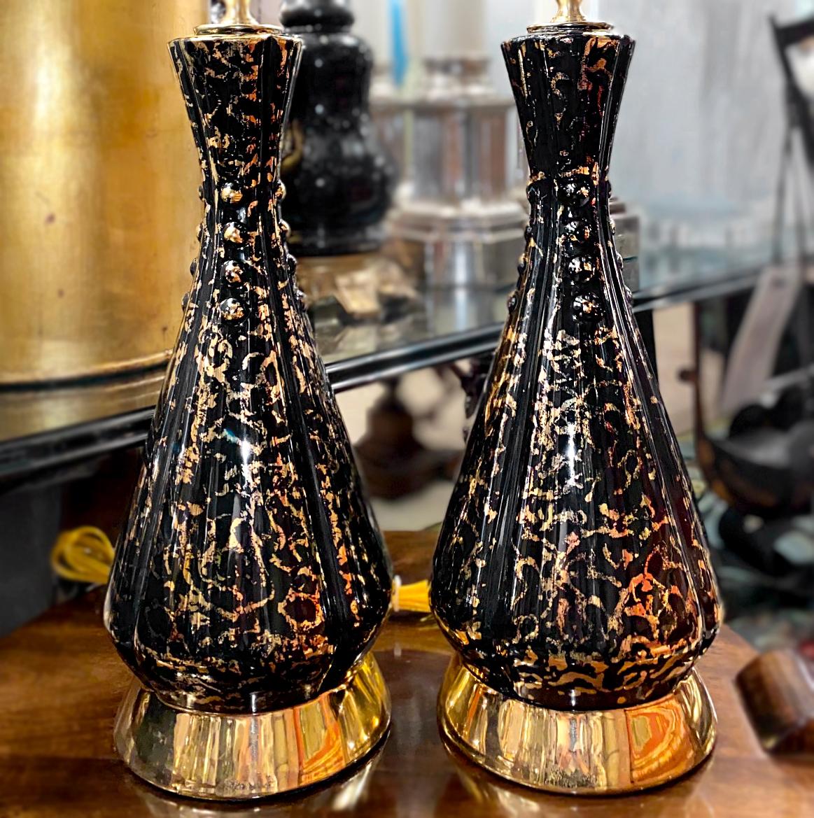 Gilt Pair of Mid Century Black Porcelain Lamps For Sale