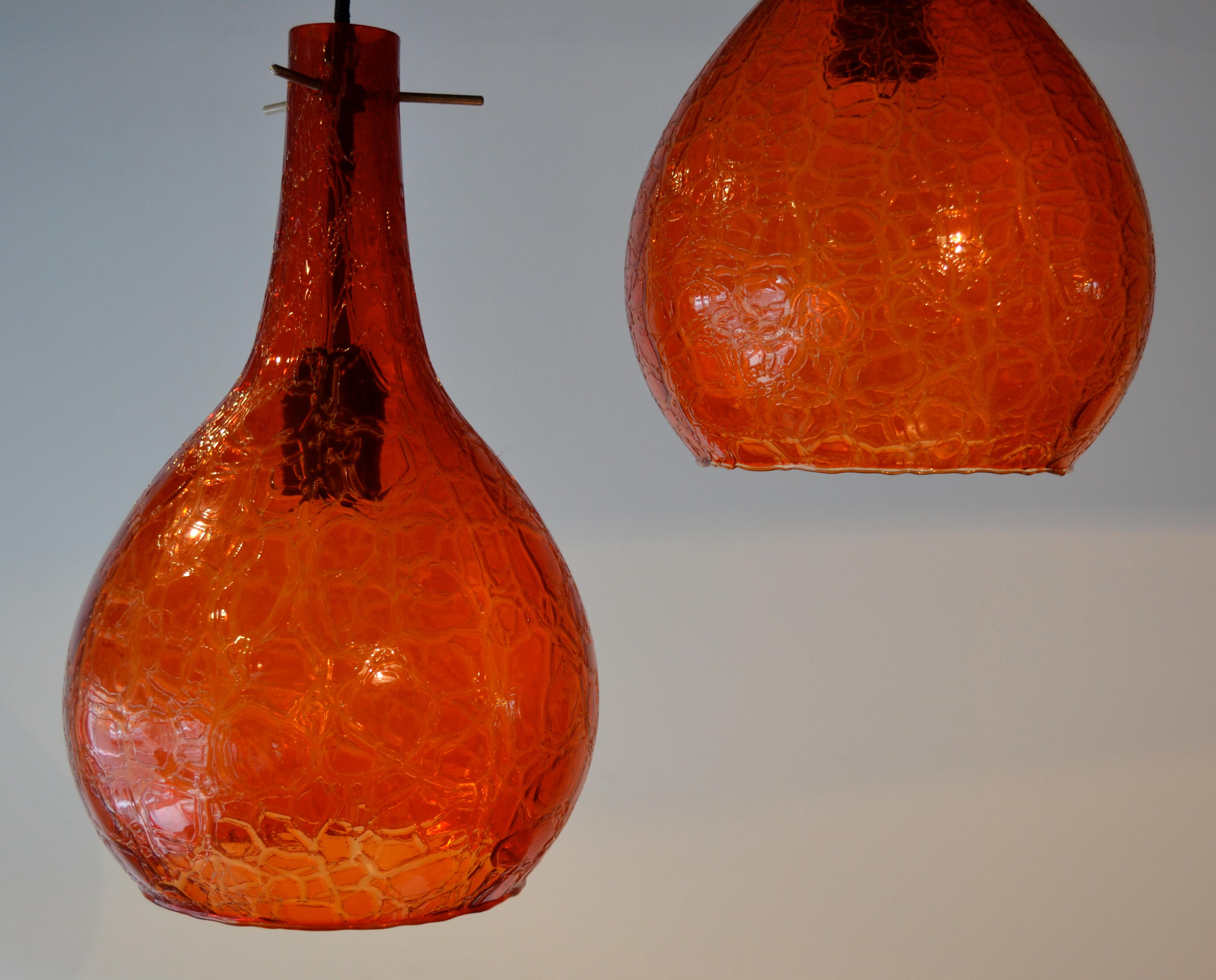 Beautiful pair of vibrant blood orange color pendant lights, Italy, 1960s. Rewiring recommended.