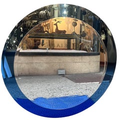 Pair of Mid-Century Blue Mirrors. Sold separately